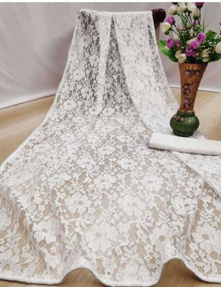 Suali Net Self Design Saree With Unstitched Blouse Piece ( White ) Suali Net Self Design Saree With Unstitched Blouse Piece ( White )