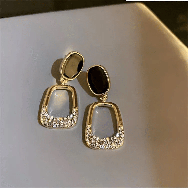     			Yugosmile Black Hoops Earrings ( Pack of 1 )
