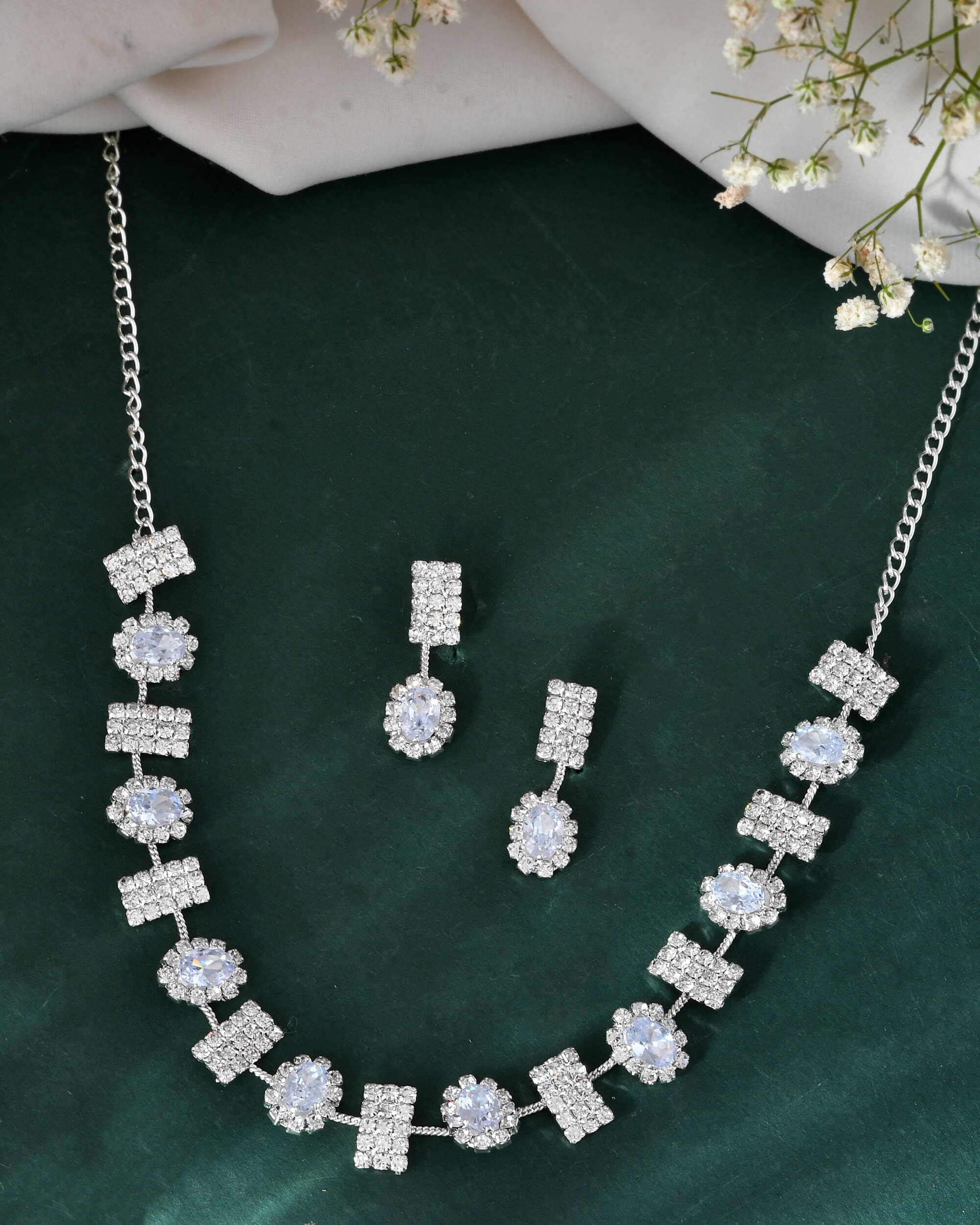     			Jewels Nest Silver Stainless Steel Necklace Set ( Pack of 1 )