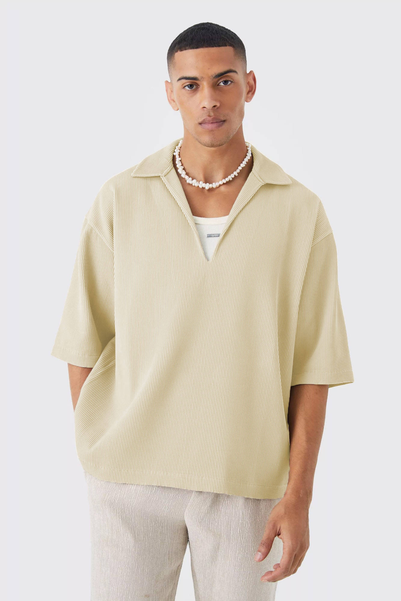     			wanquila Men Cotton Blend Oversized Fit Solid Polo T Shirt ( Cream )