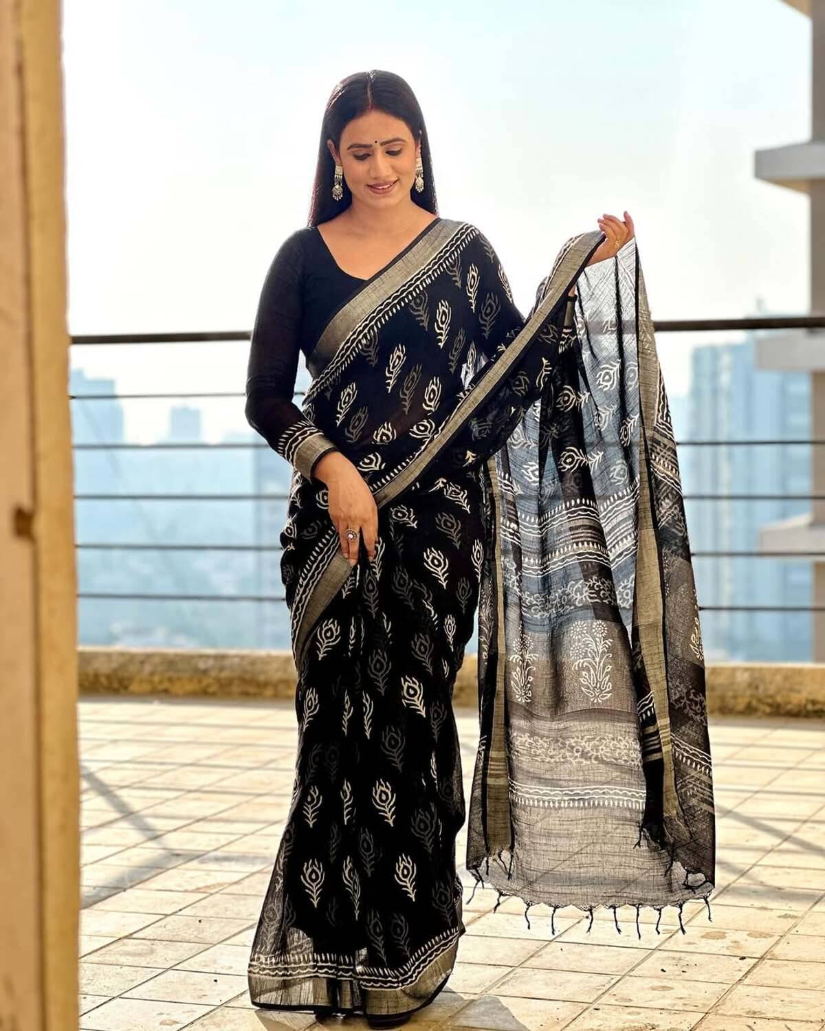 HITESH ENTERPRISE Linen Self Design Saree With Unstitched Blouse Piece ( Black ) HITESH ENTERPRISE Linen Self Design Saree With Unstitched Blouse Piece ( Black )
