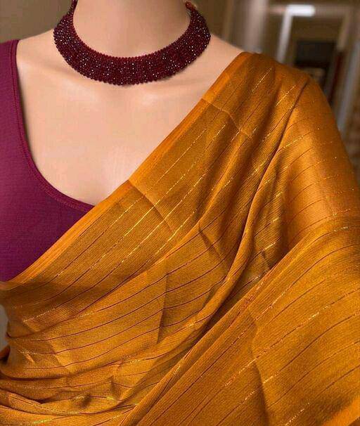     			JIRA Georgette Printed Saree With Unstitched Blouse Piece ( Gold )