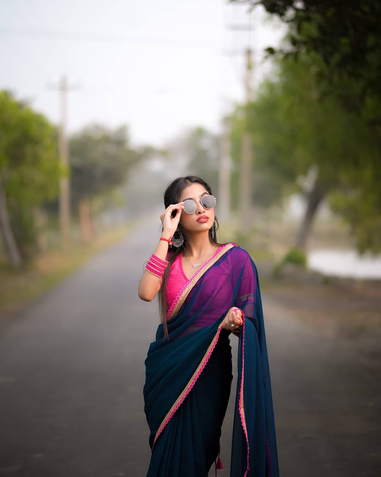     			Apnisha Georgette Solid Saree With Unstitched Blouse Piece ( Navy Blue )