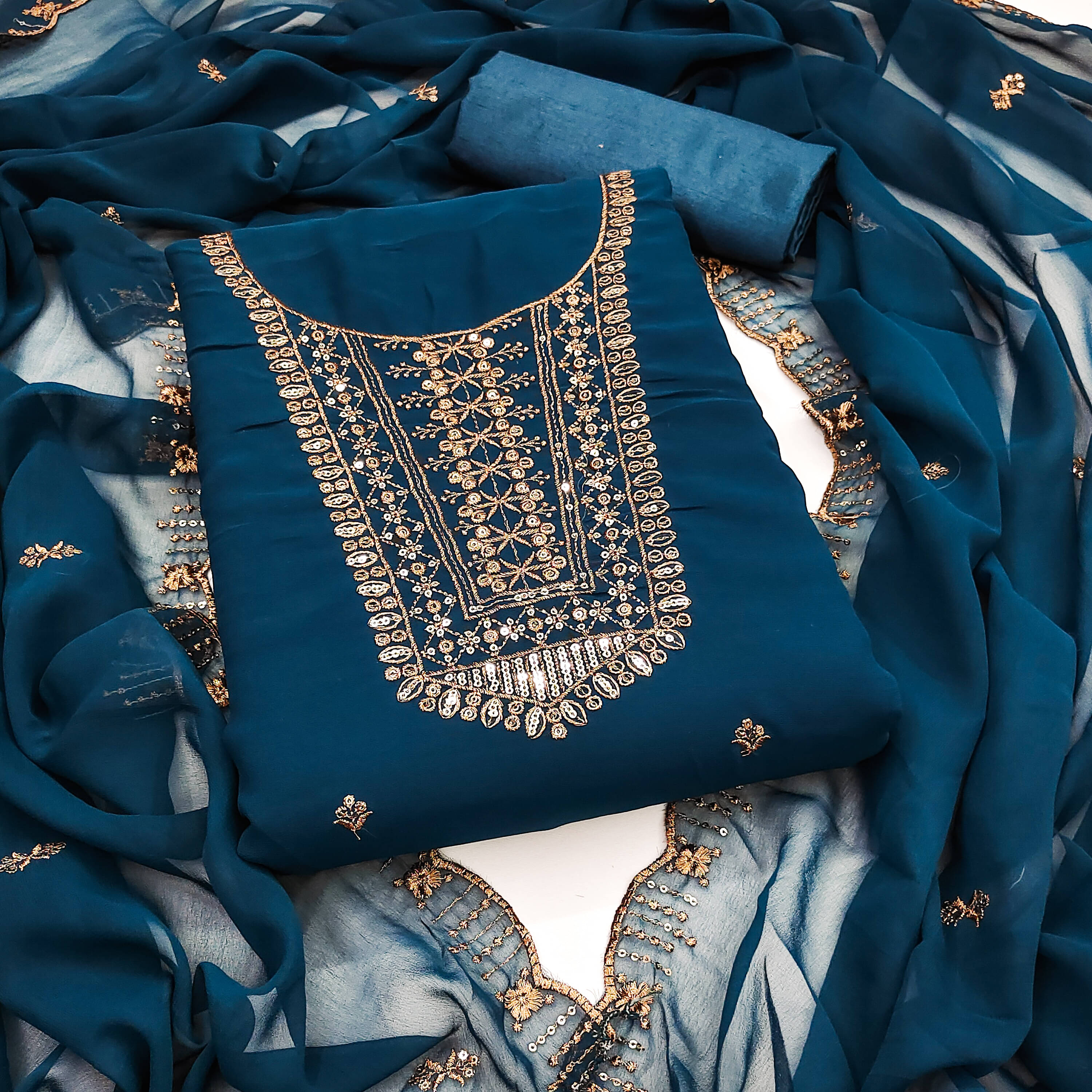     			Nayanthara Trends Women Georgette Unstitched Dress Material ( Blue )