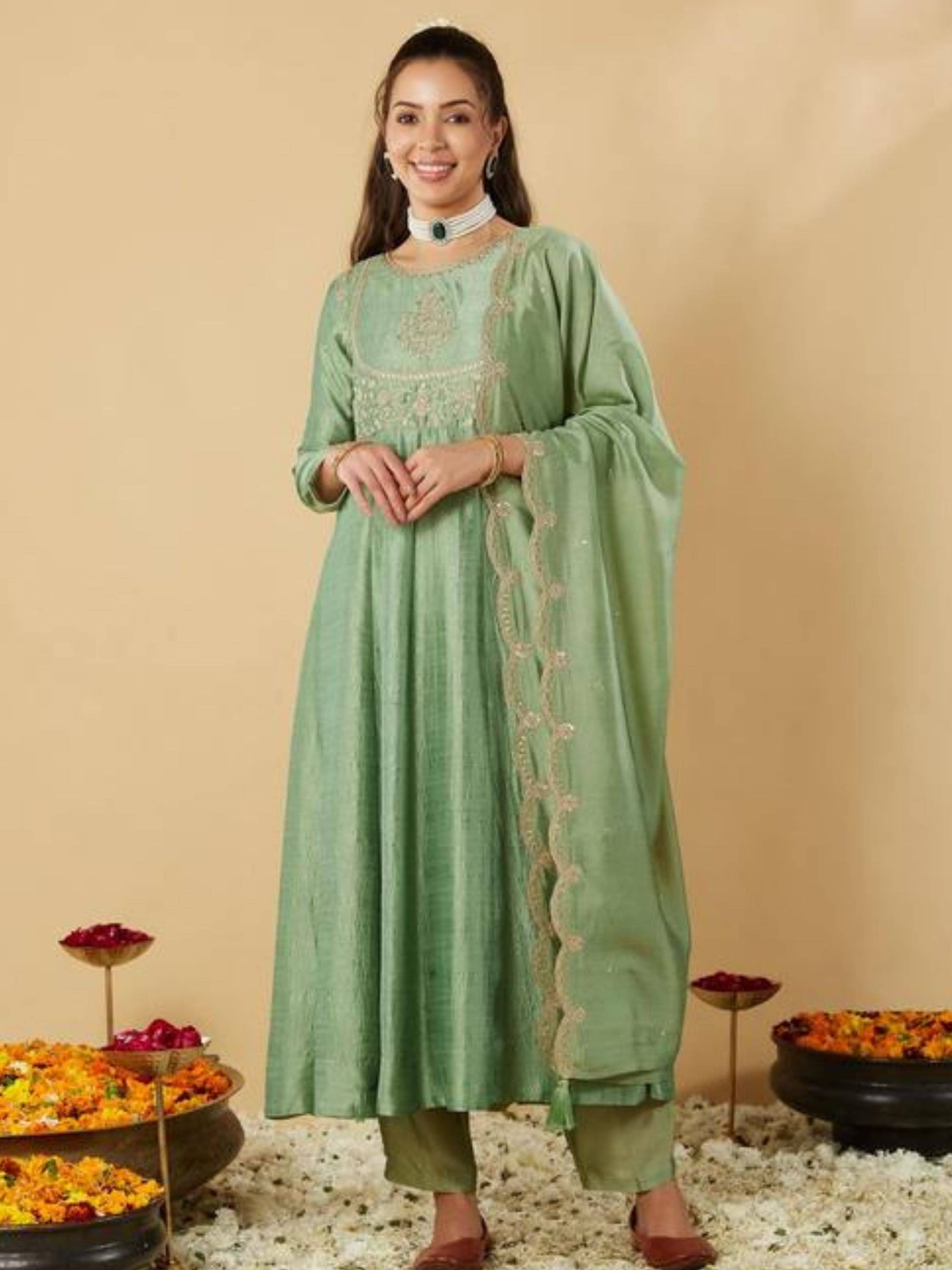 Niza Fashion Women Silk Embroidered Straight Kurti With Pants ( Green ) Niza Fashion Women Silk Embroidered Straight Kurti With Pants ( Green )