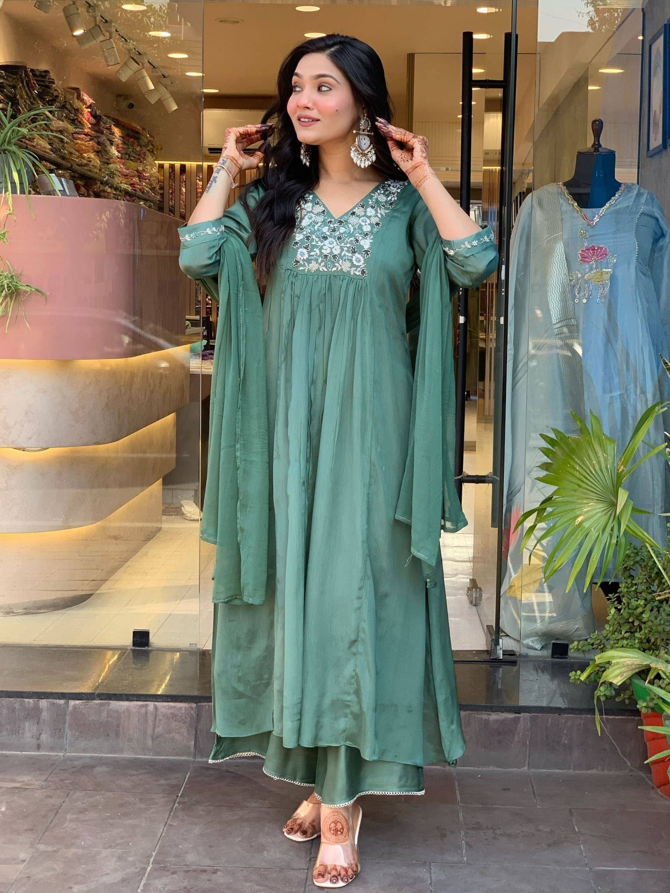 Niza Fashion Women Viscose Embroidered Straight Kurti With Pants ( Green ) Niza Fashion Women Viscose Embroidered Straight Kurti With Pants ( Green )
