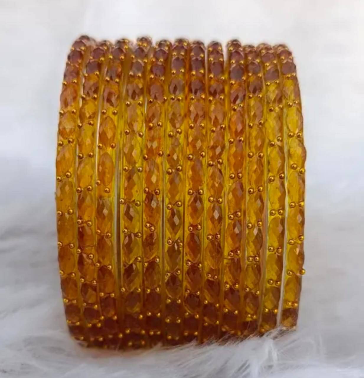 Divine Glass Gold Bangle ( Pack of 12 ) Divine Glass Gold Bangle ( Pack of 12 )
