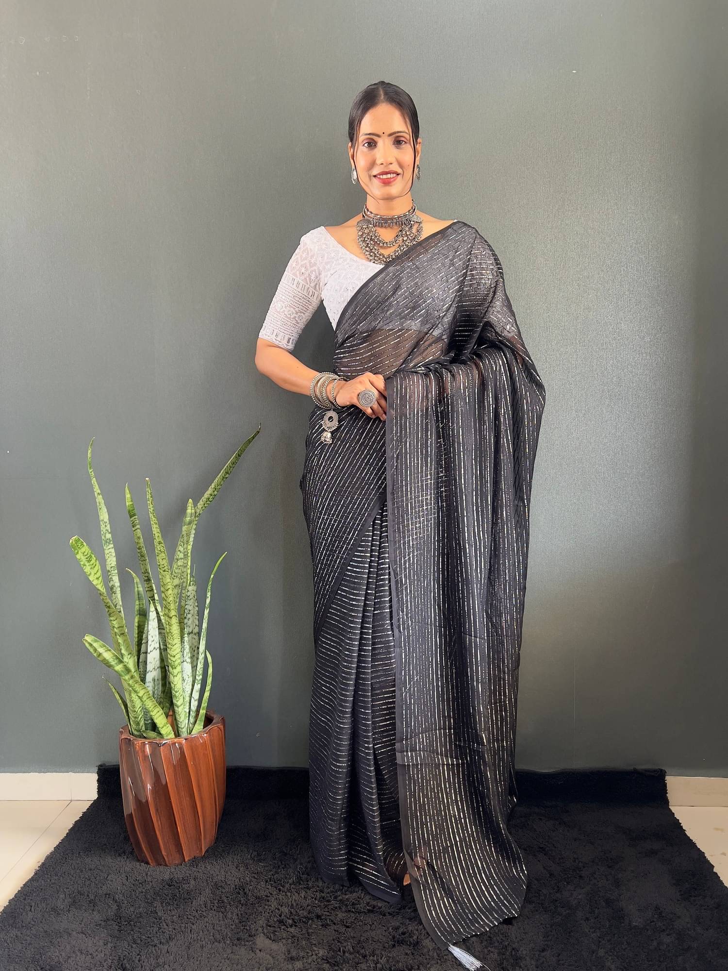 A TO Z CART Chiffon Striped Saree With Unstitched Blouse Piece ( Black ) A TO Z CART Chiffon Striped Saree With Unstitched Blouse Piece ( Black )