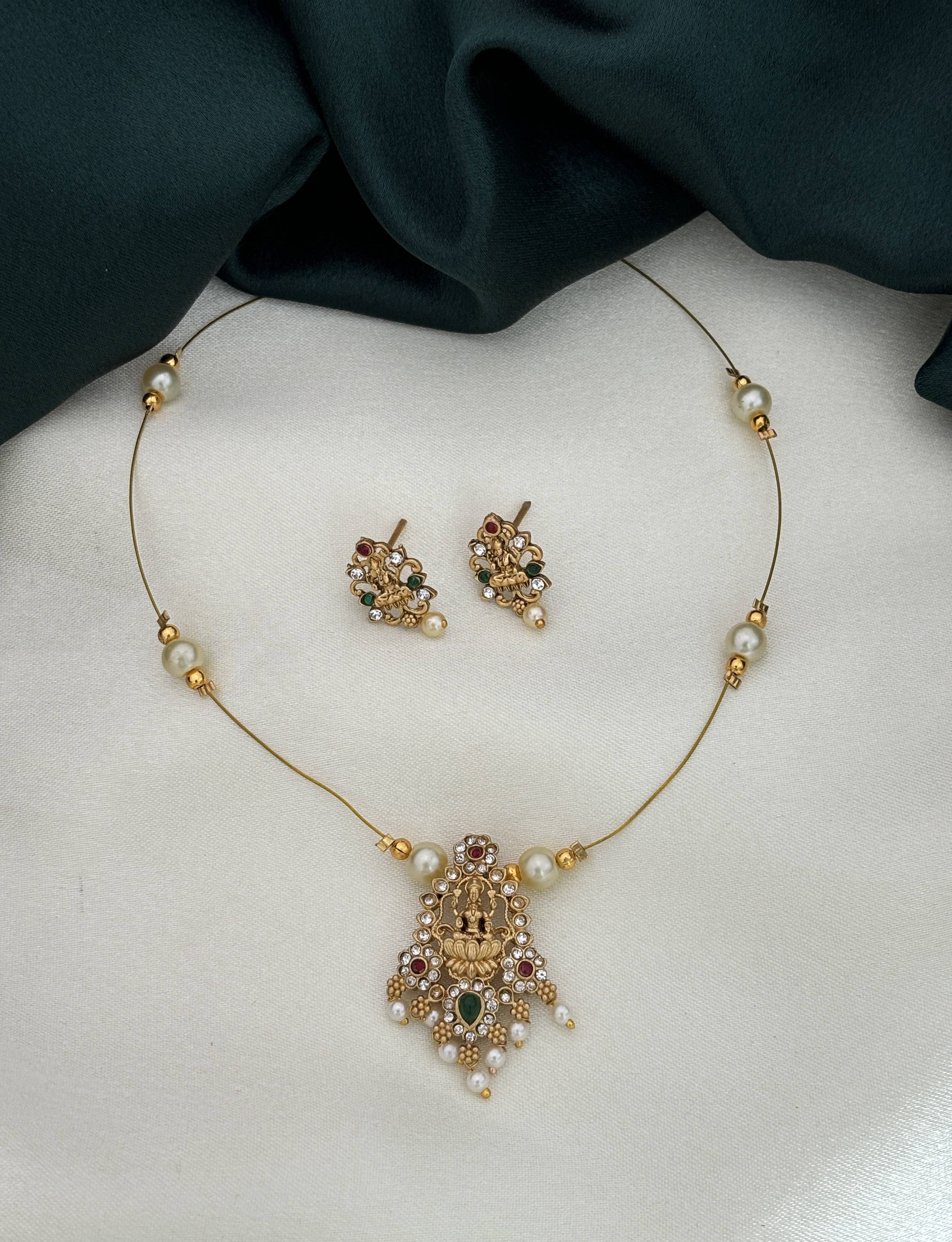     			ROFARWORD Gold Brass Necklace Set ( Pack of 1 )