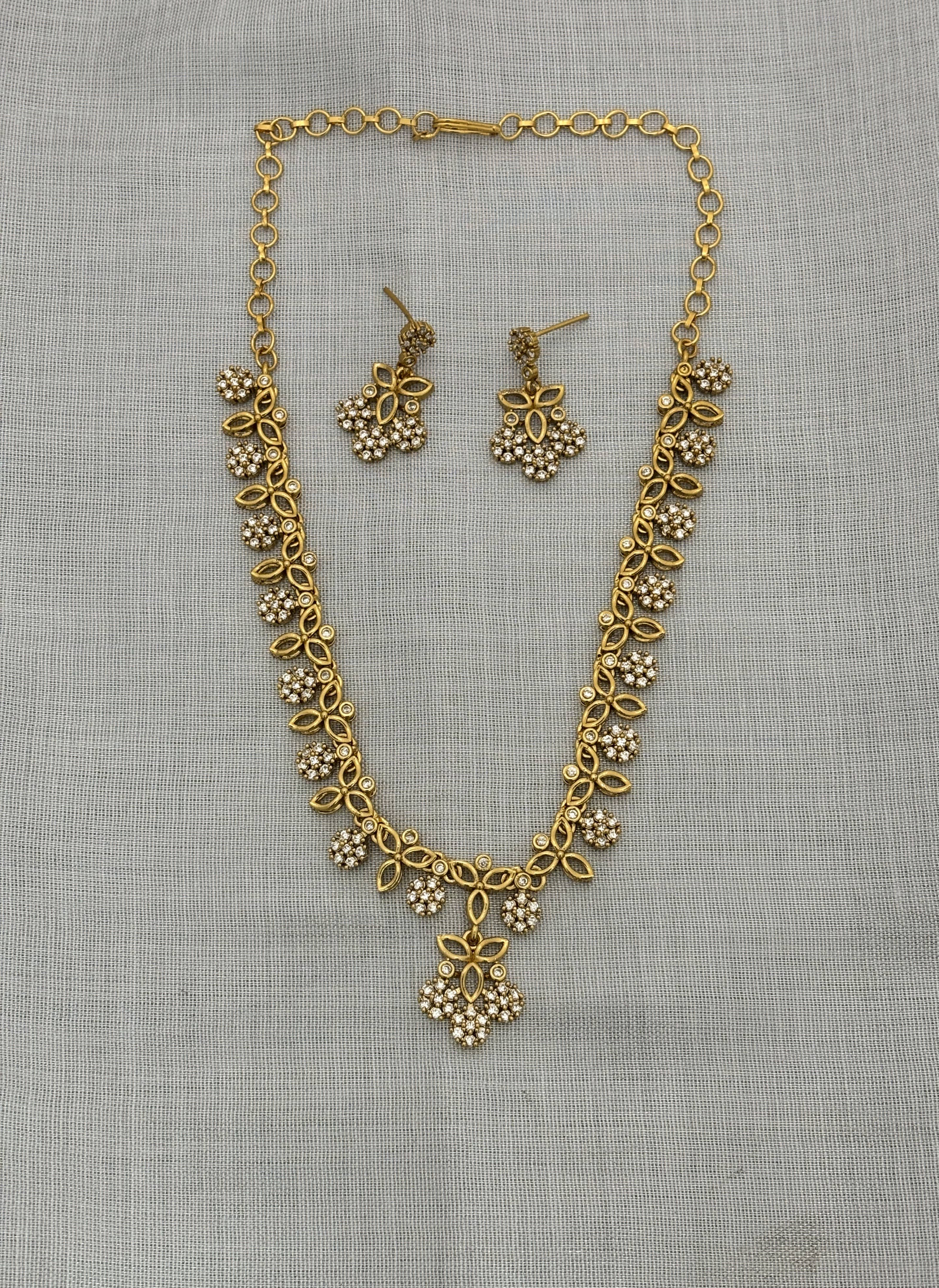 ROFARWORD Gold Brass Necklace Set ( Pack of 1 )