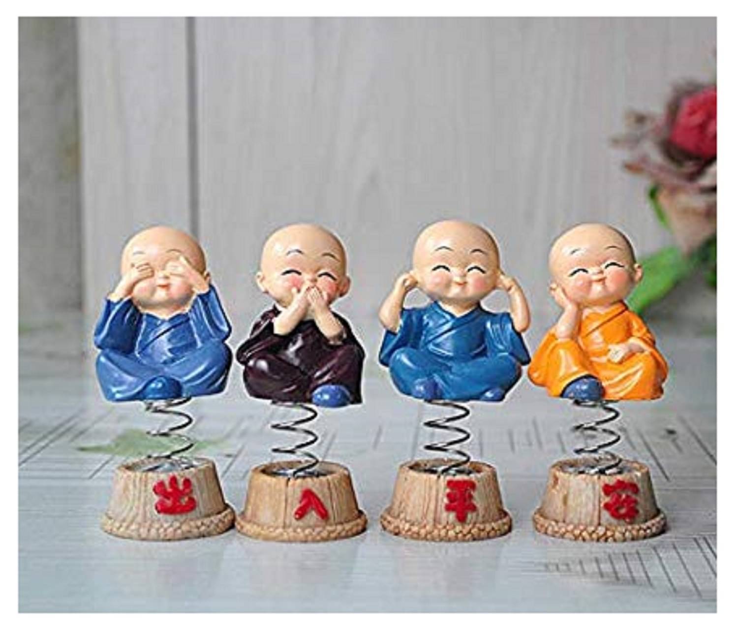 Spreading Smiles Resting Buddha Showpiece 9 cm - Pack of 4 Spreading Smiles Resting Buddha Showpiece 9 cm - Pack of 4