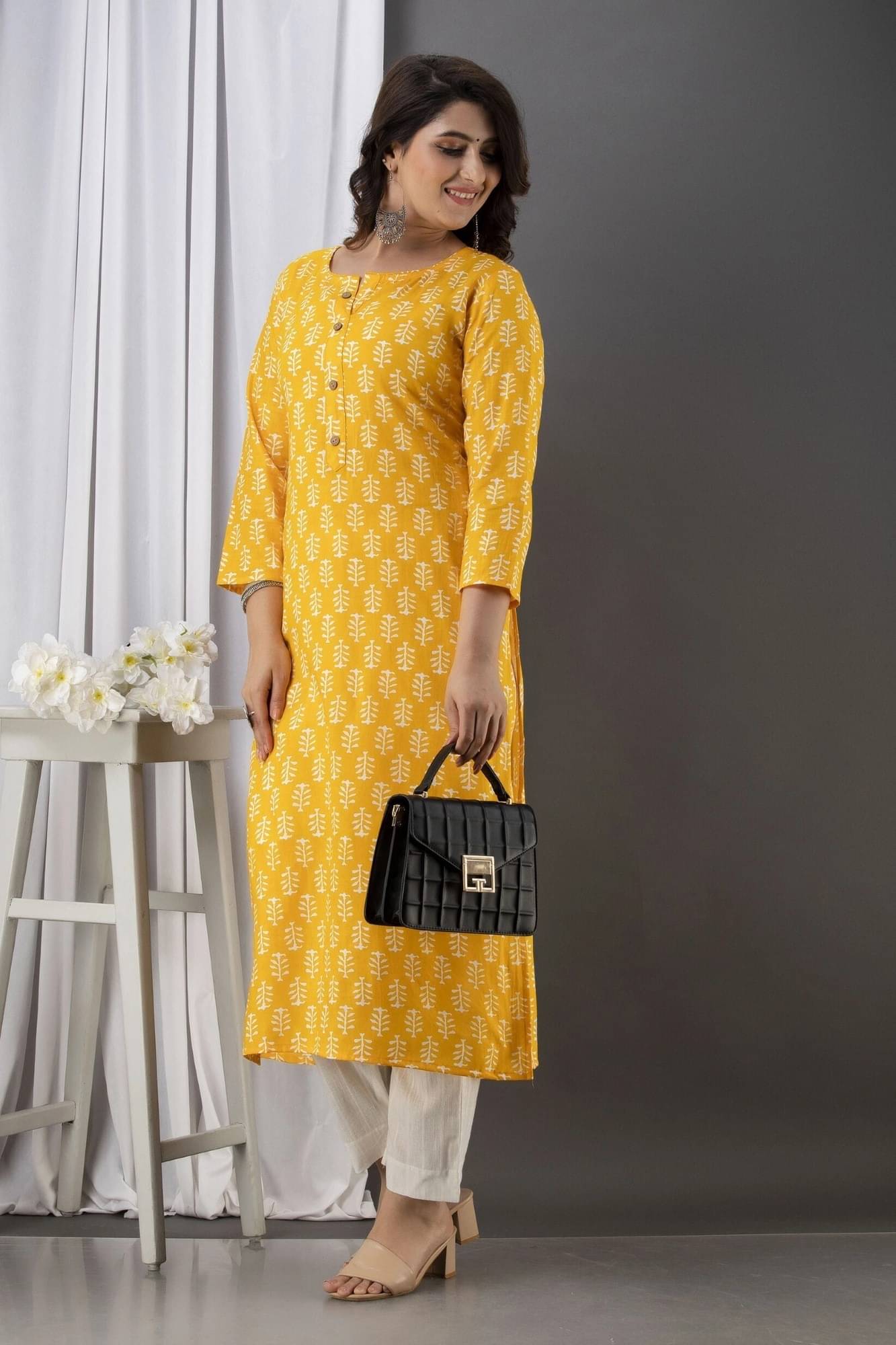 Greyshade Women's Cotton Blend Printed Straight Kurti - ( Yellow ) Greyshade Women's Cotton Blend Printed Straight Kurti - ( Yellow )