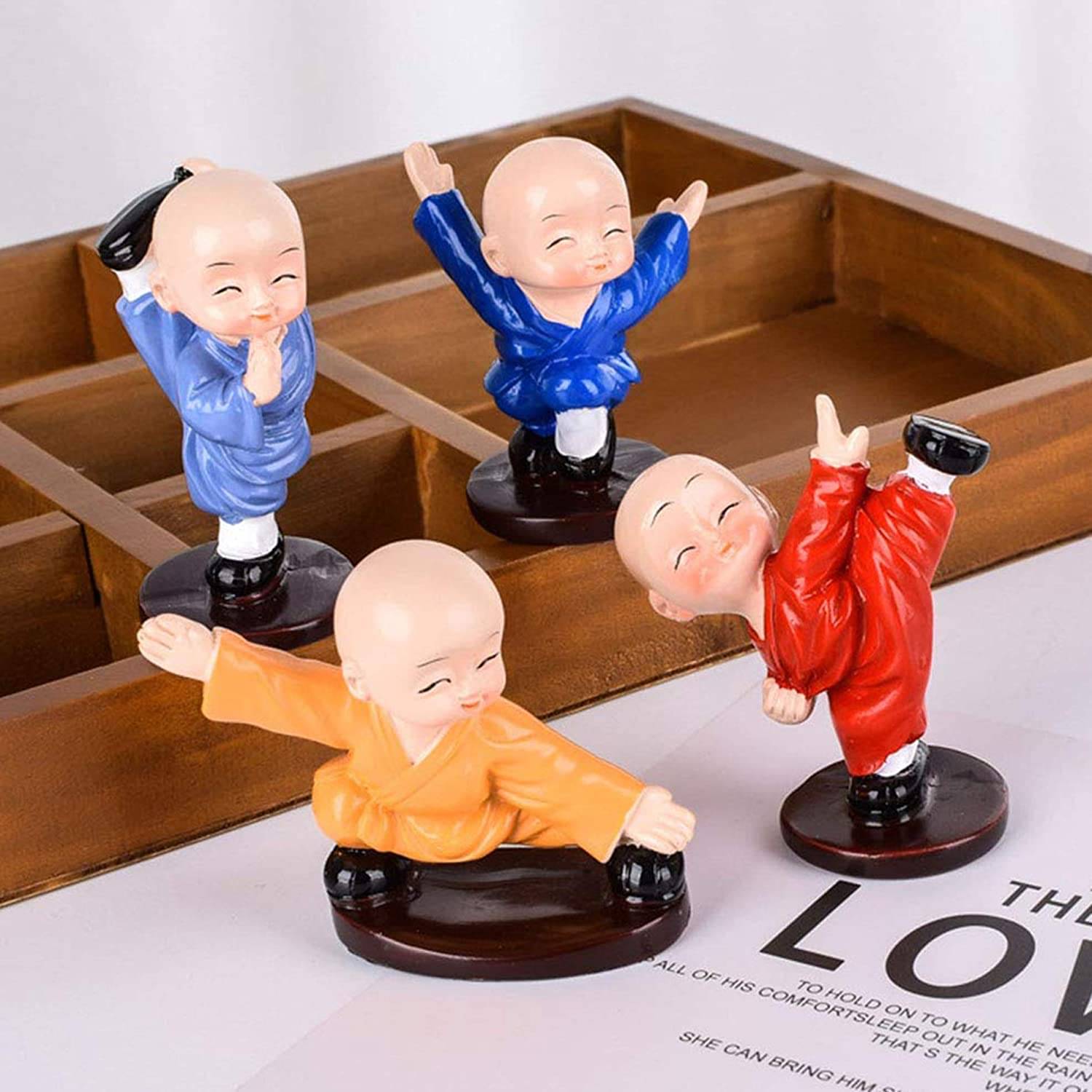 Spreading Smiles Resting Buddha Showpiece 7 cm - Pack of 4 Spreading Smiles Resting Buddha Showpiece 7 cm - Pack of 4