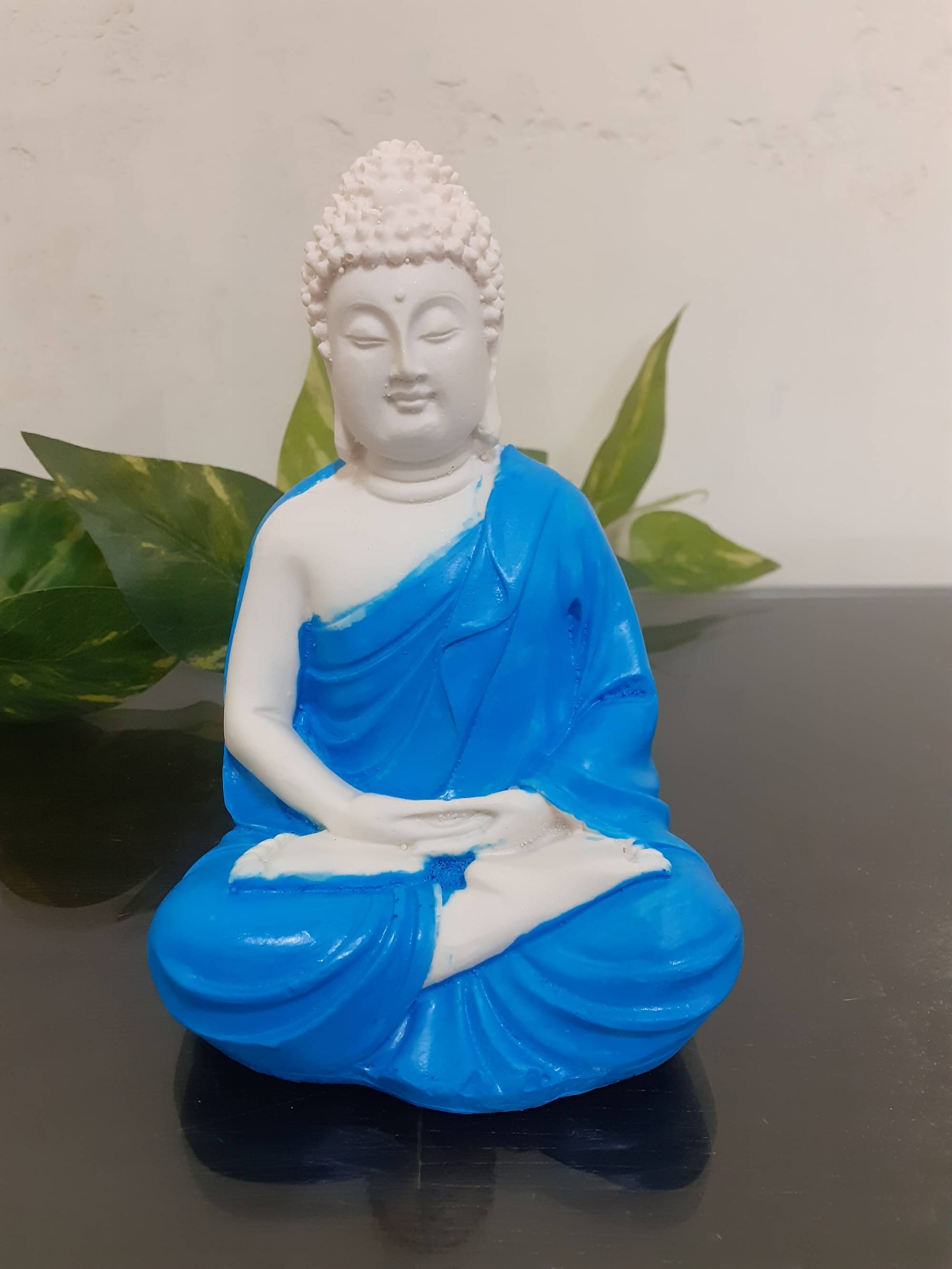 Spreading Smiles Resting Buddha Showpiece 9 cm - Pack of 1 Spreading Smiles Resting Buddha Showpiece 9 cm - Pack of 1