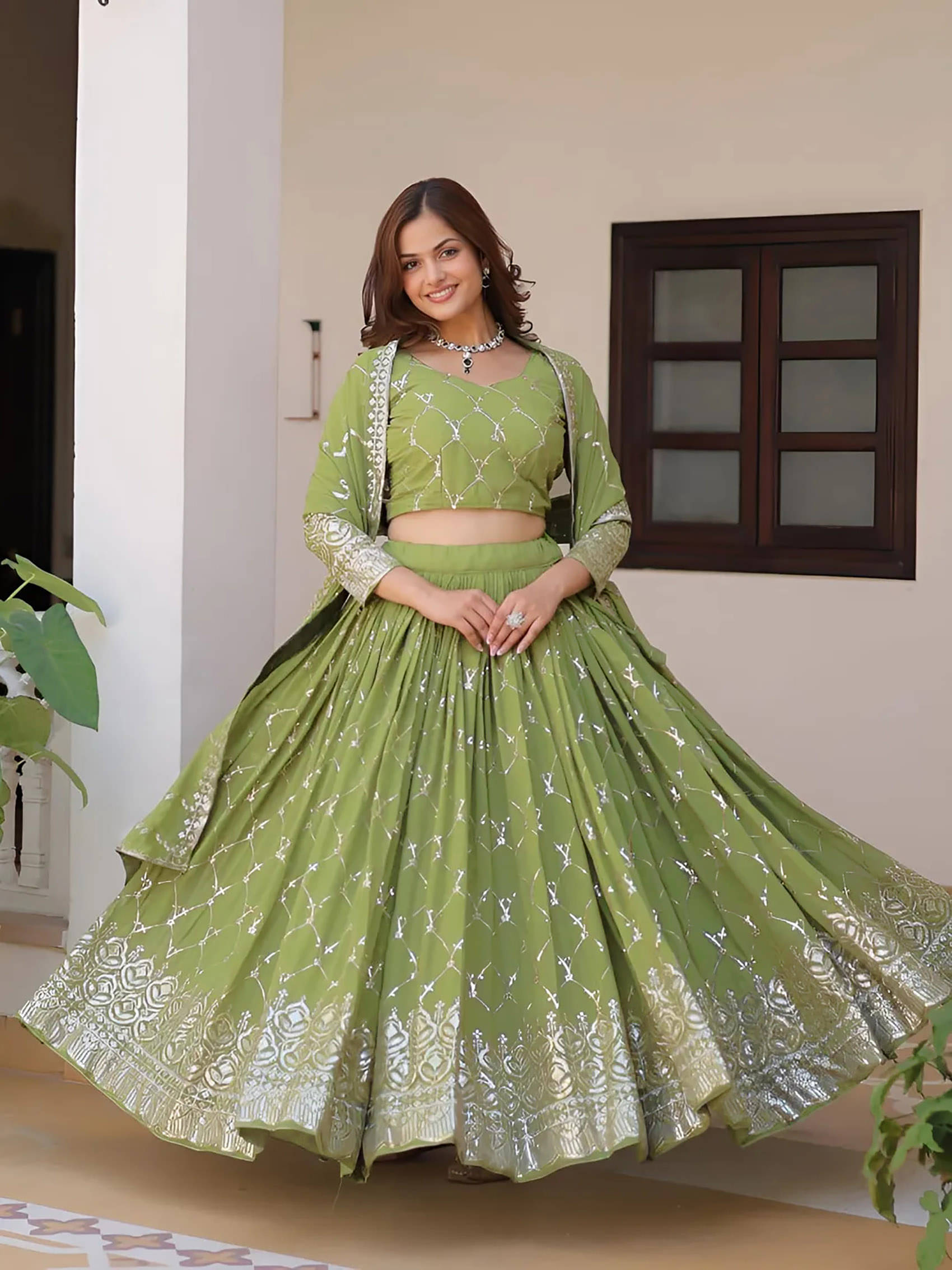     			Trijal Fab Green Georgette Circular Stitched Lehenga