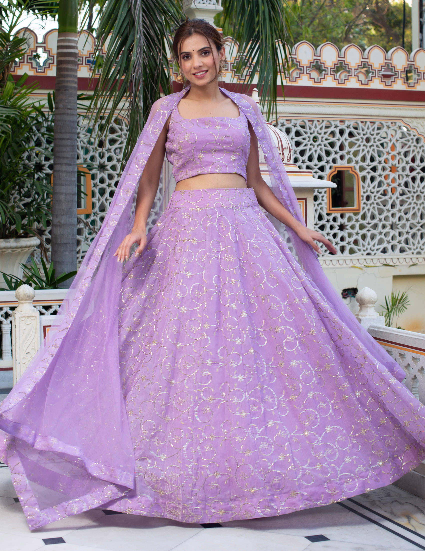     			Trijal Fab Purple Georgette Circular Stitched Lehenga