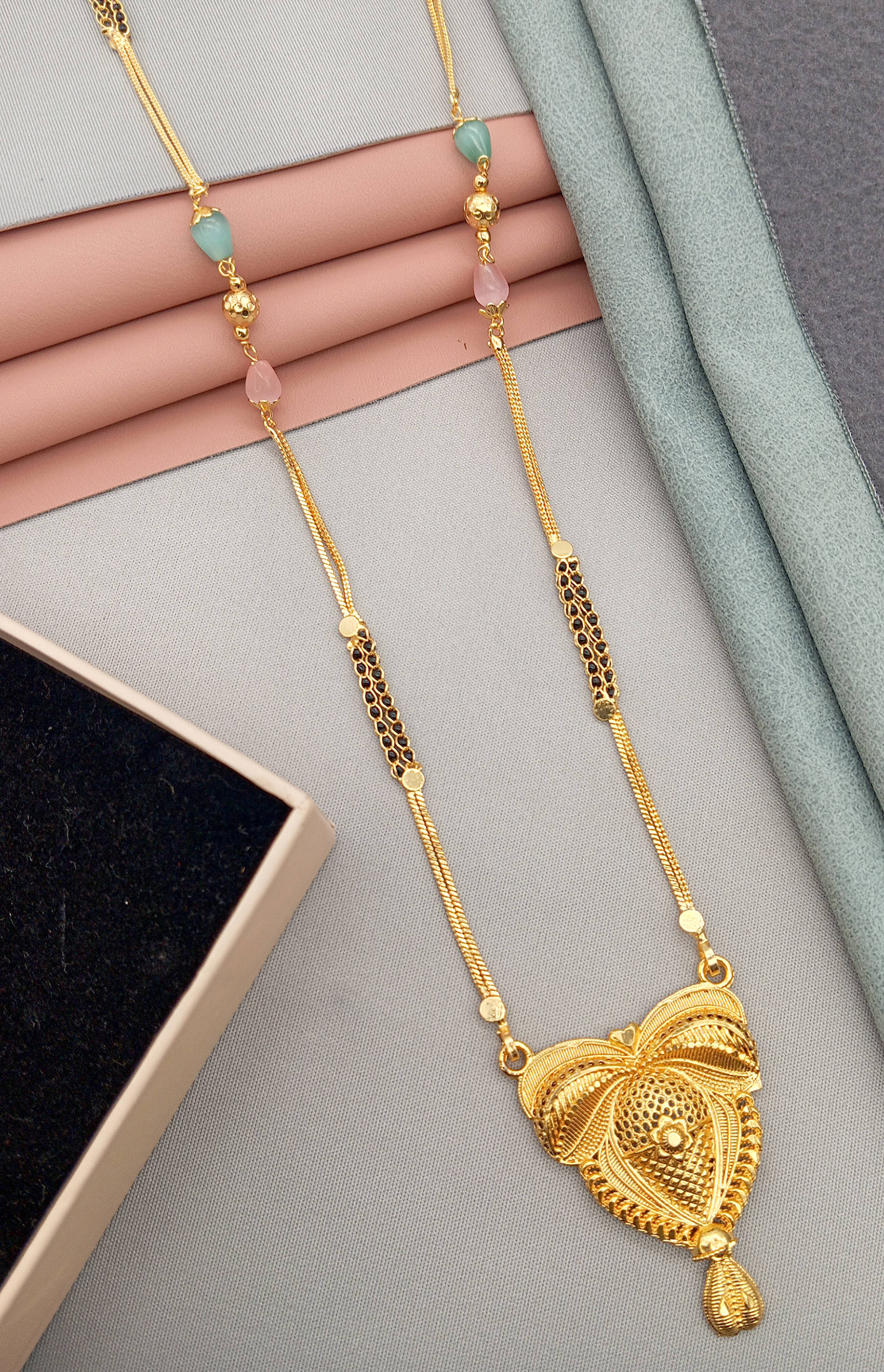 SHANKH-KRIVA Golden Mangalsutra ( Pack of 1 ) SHANKH-KRIVA Golden Mangalsutra ( Pack of 1 )