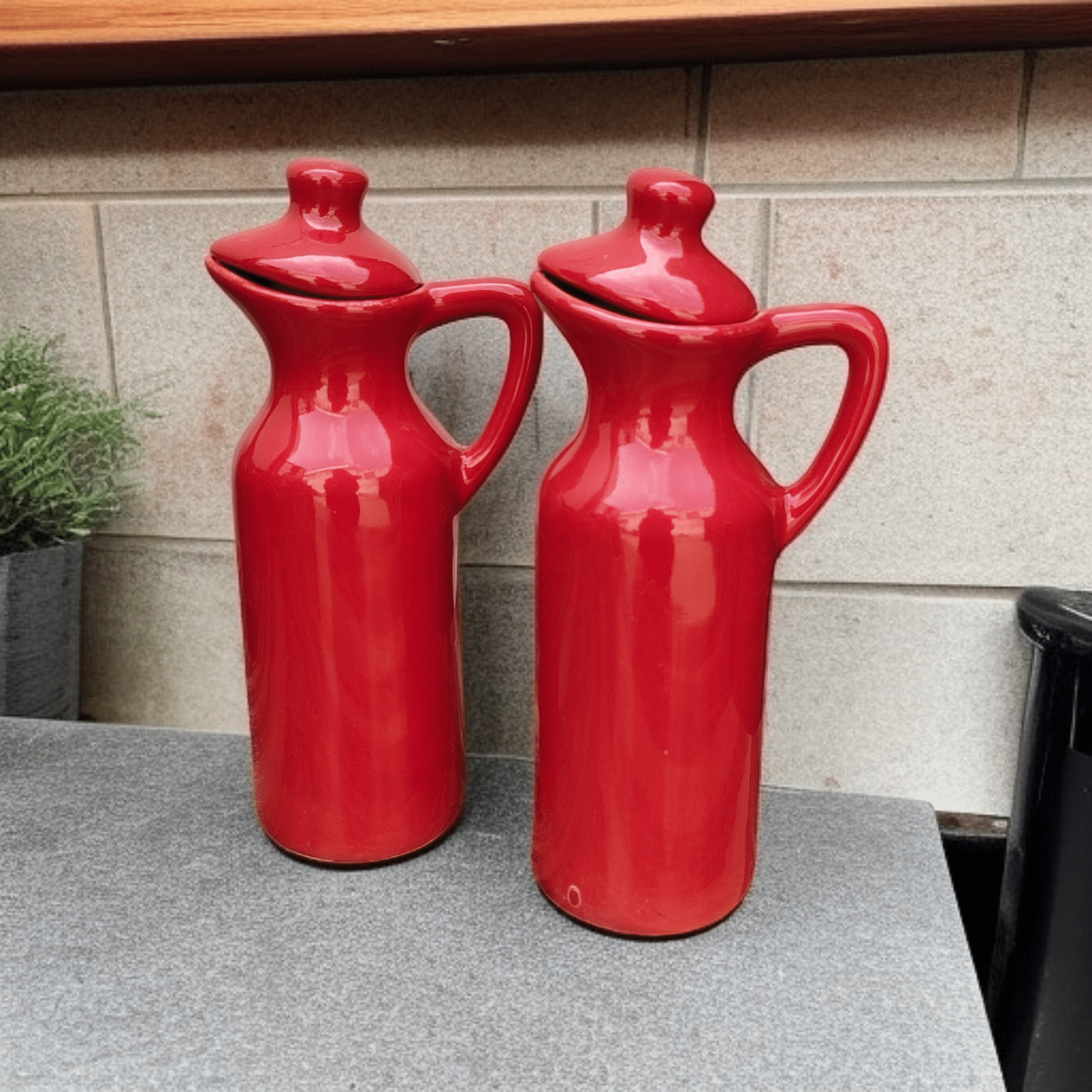     			Malaikah Red Sld Oil Dspnsr Ceramic Red Oil Container ( Set of 2 )