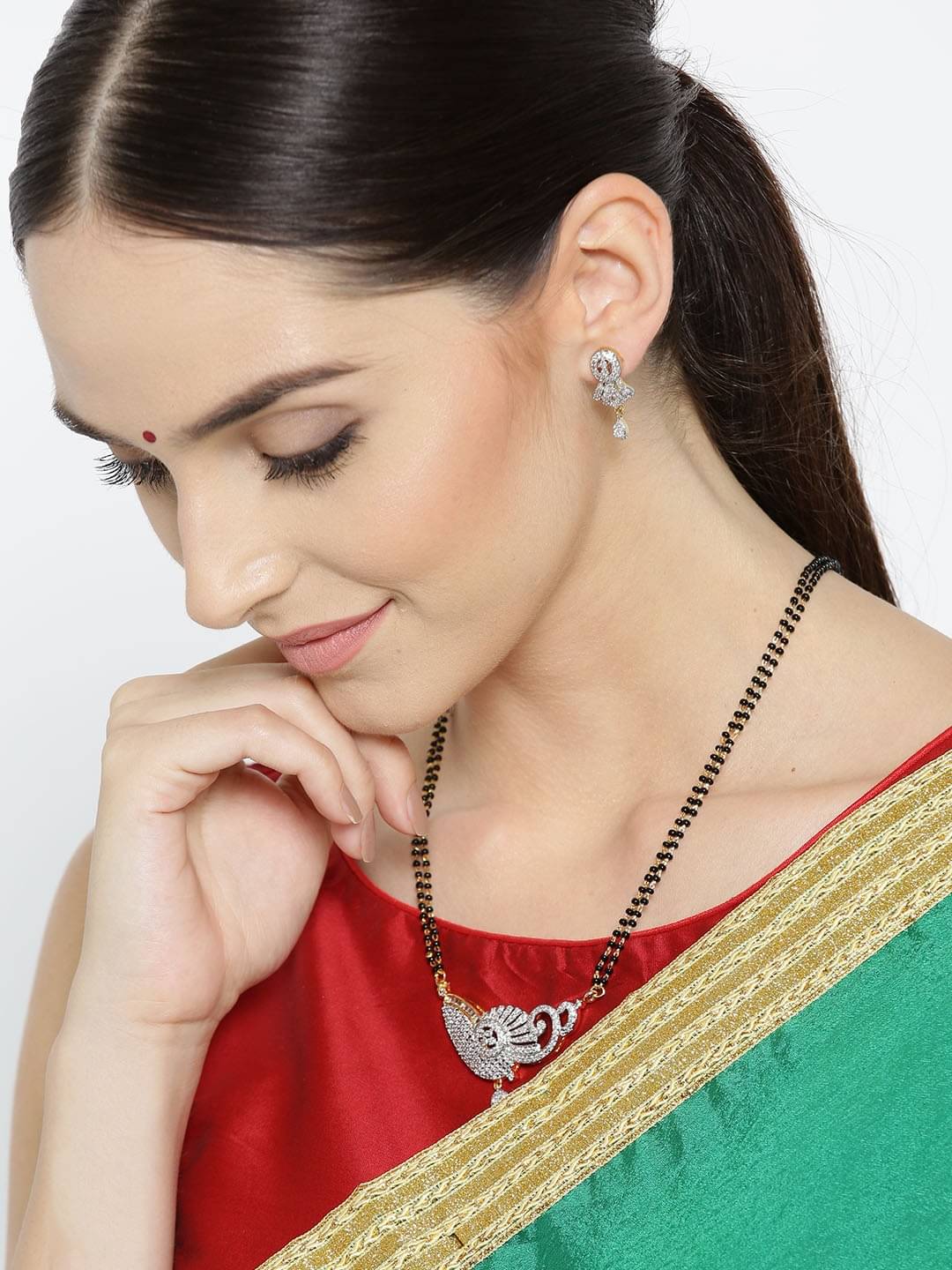 YOUBELLA Golden Mangalsutra Set ( Pack of 1 )     			YOUBELLA Golden Mangalsutra Set ( Pack of 1 )