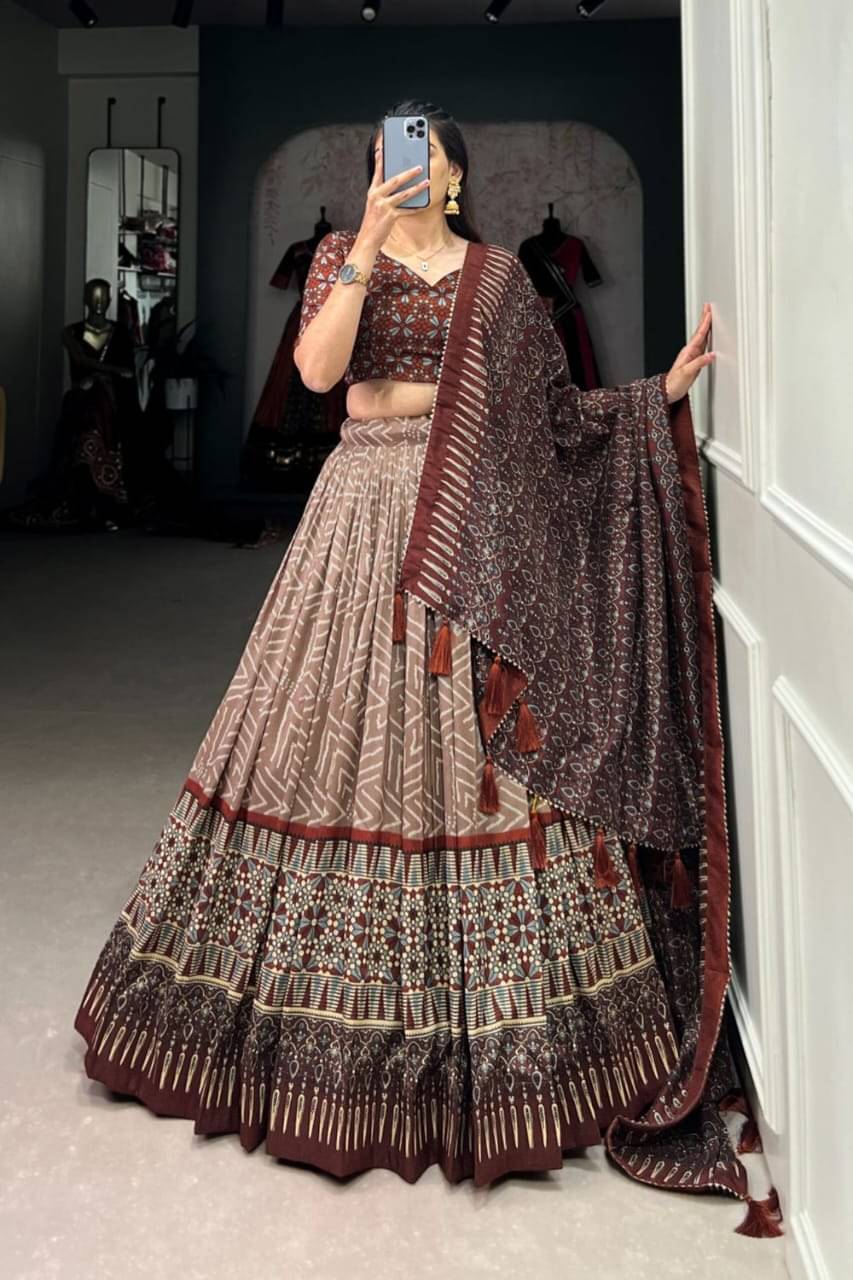 CYNOR Brown Tussar Silk Chaniya Choli Semi Stitched Lehenga Single CYNOR Brown Tussar Silk Chaniya Choli Semi Stitched Lehenga Single