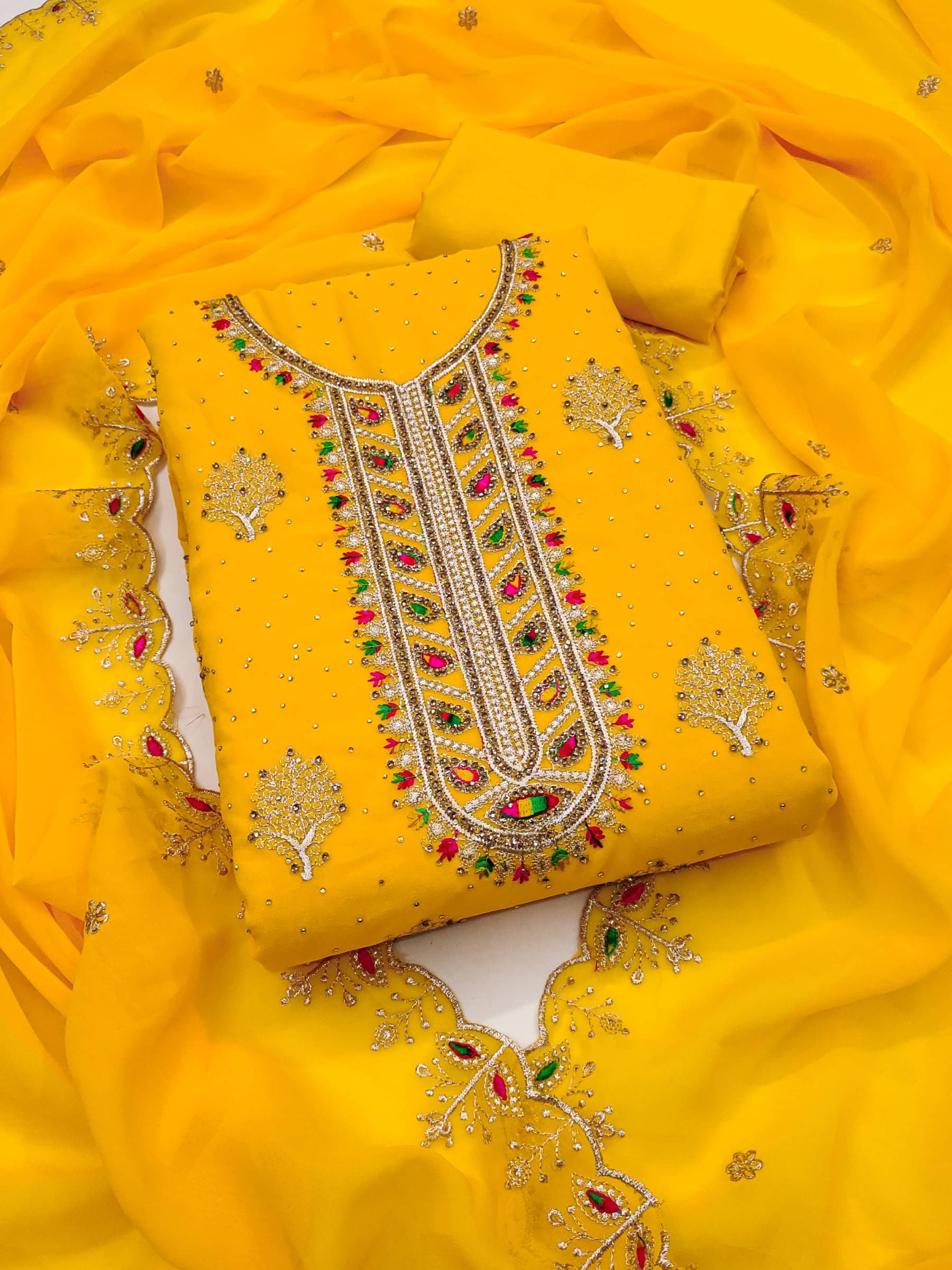     			Rangtulika Ethnics Women Georgette Unstitched Dress Material ( Yellow )