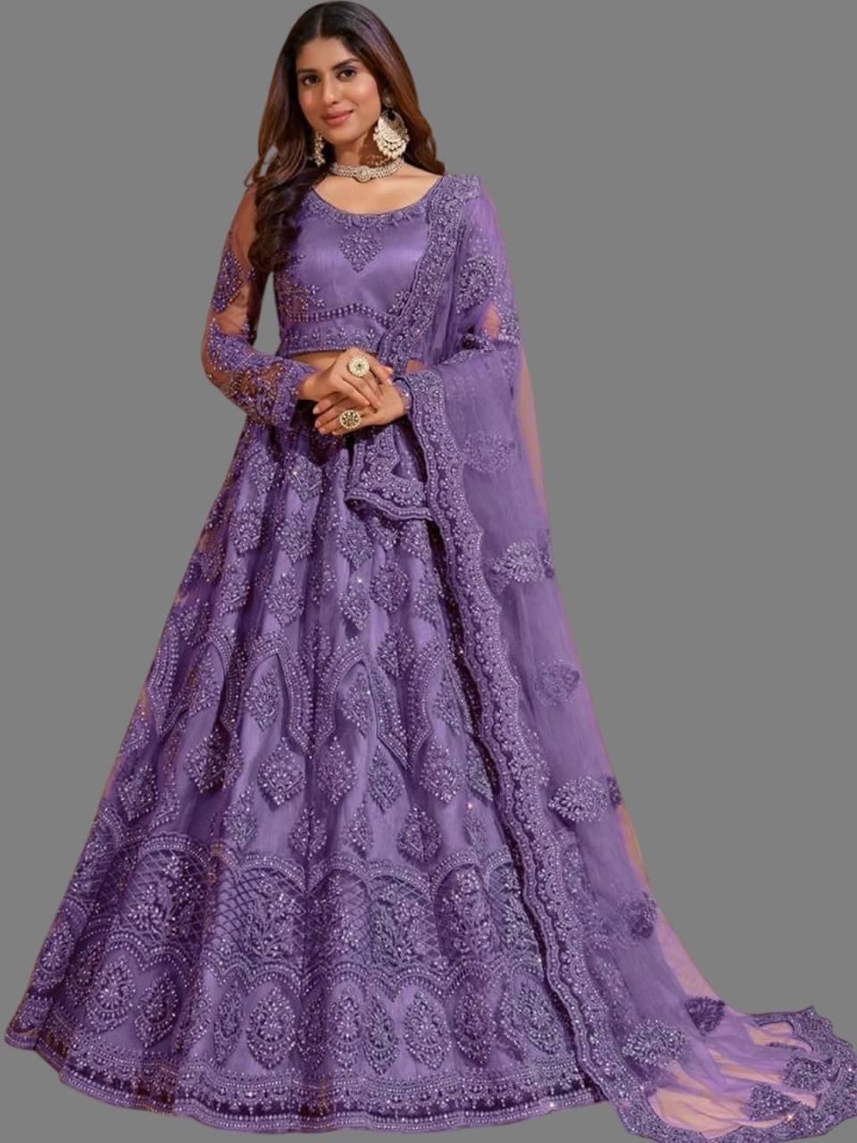Apnisha Purple Net Unstitched Semi Stitched Lehenga Single     			Apnisha Purple Net Unstitched Semi Stitched Lehenga Single
