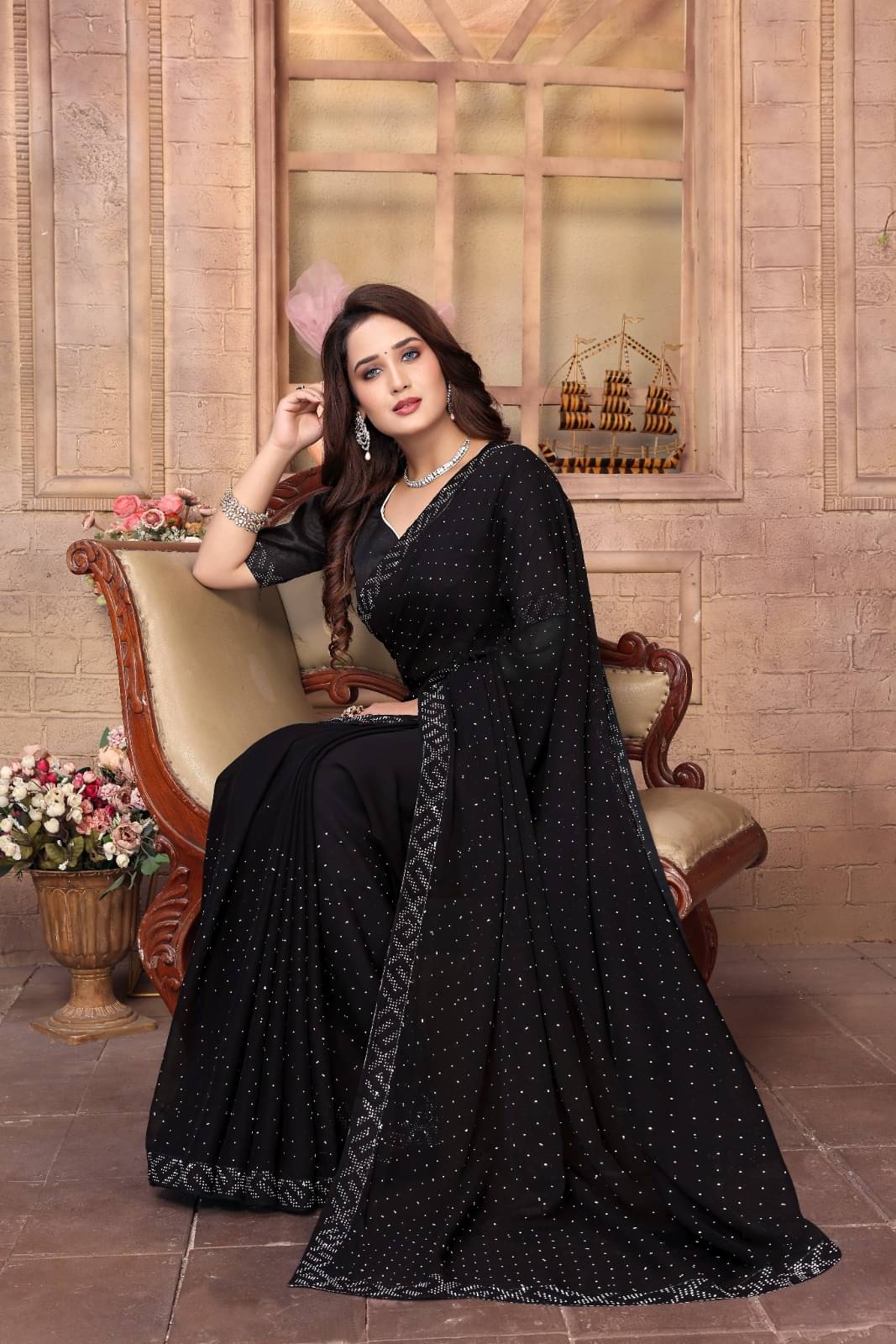     			DEBRIS FAB Georgette Embellished Saree With Unstitched Blouse Piece ( Black )