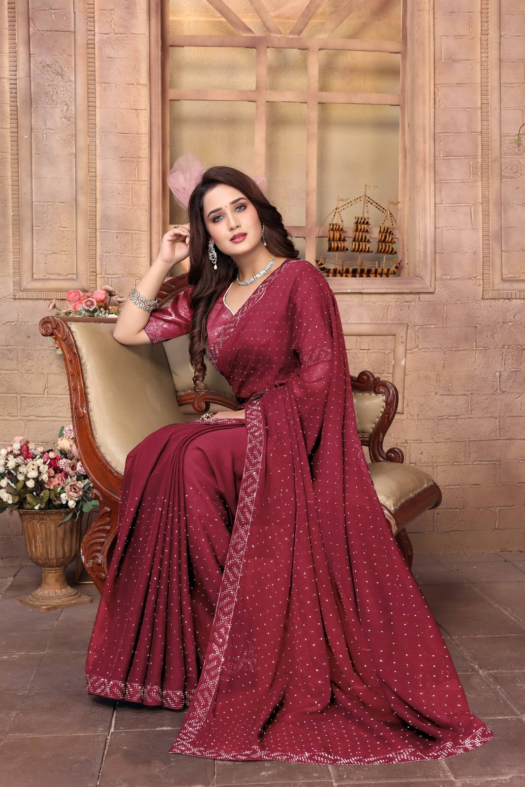     			DEBRIS FAB Georgette Embellished Saree With Unstitched Blouse Piece ( Maroon )