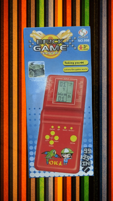     			OLIFIN Nostalgic Handheld Portable Brick Game | Indoor & Outdoor | 9999 in 1 Video Game | Multicolor Pack of 1  ( Any Colour )