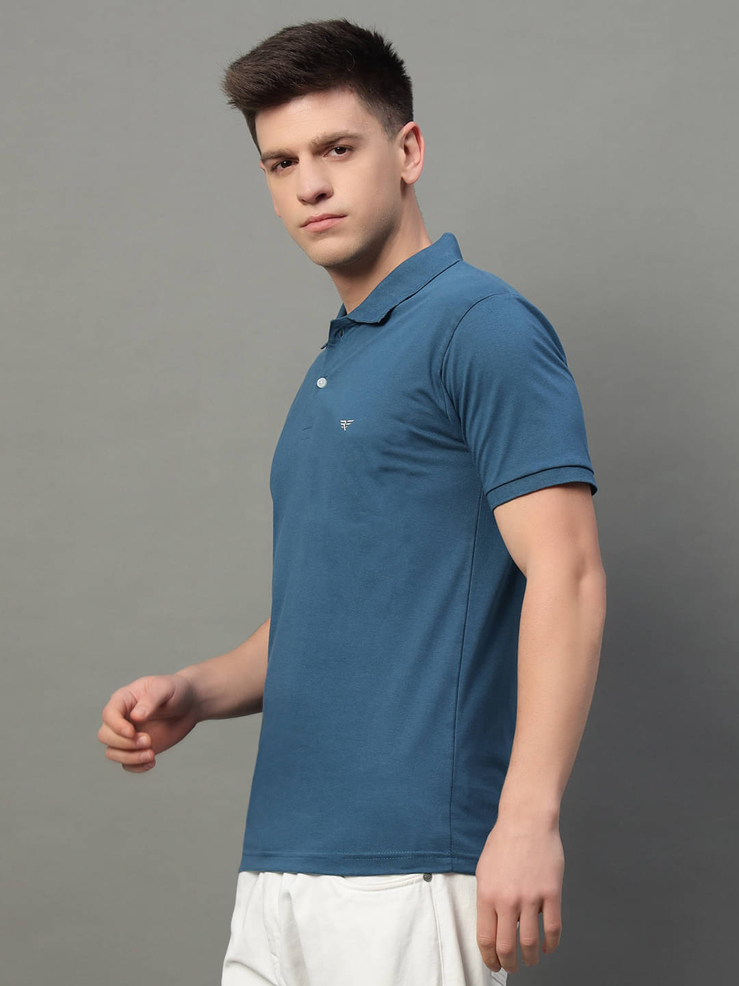 XYRIS Men Cotton Blend Regular Fit Solid Polo T Shirt ( Teal Blue ) XYRIS Men Cotton Blend Regular Fit Solid Polo T Shirt ( Teal Blue )