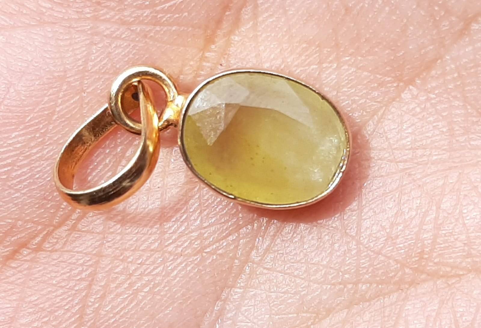     			NATURAL AND TOP QUALITY YELLOW STONE GOLD PLATED PENDENT