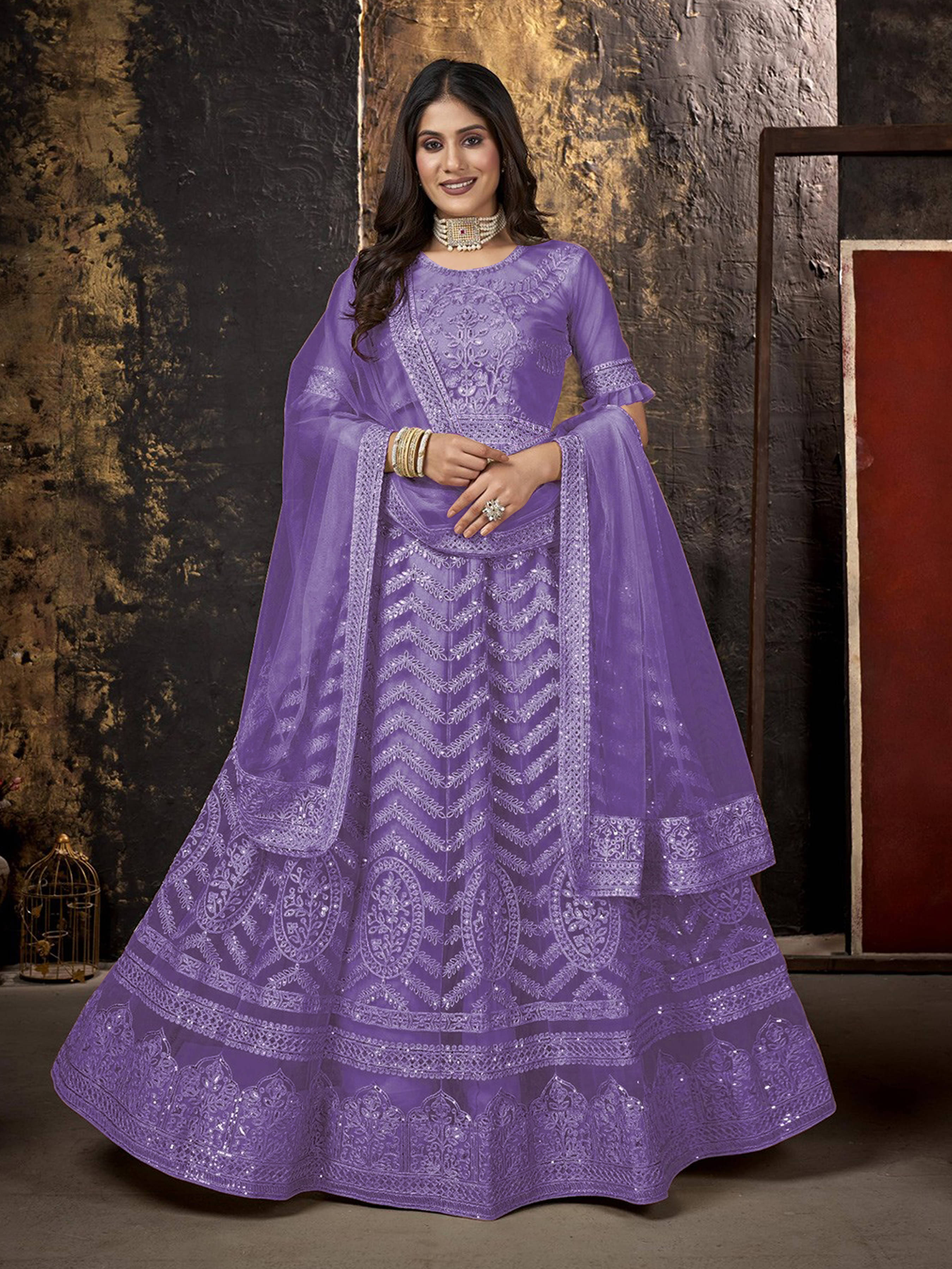 Aika Women Net Flared Semi Stitched Ethnic Gown ( Lavender ) Aika Women Net Flared Semi Stitched Ethnic Gown ( Lavender )