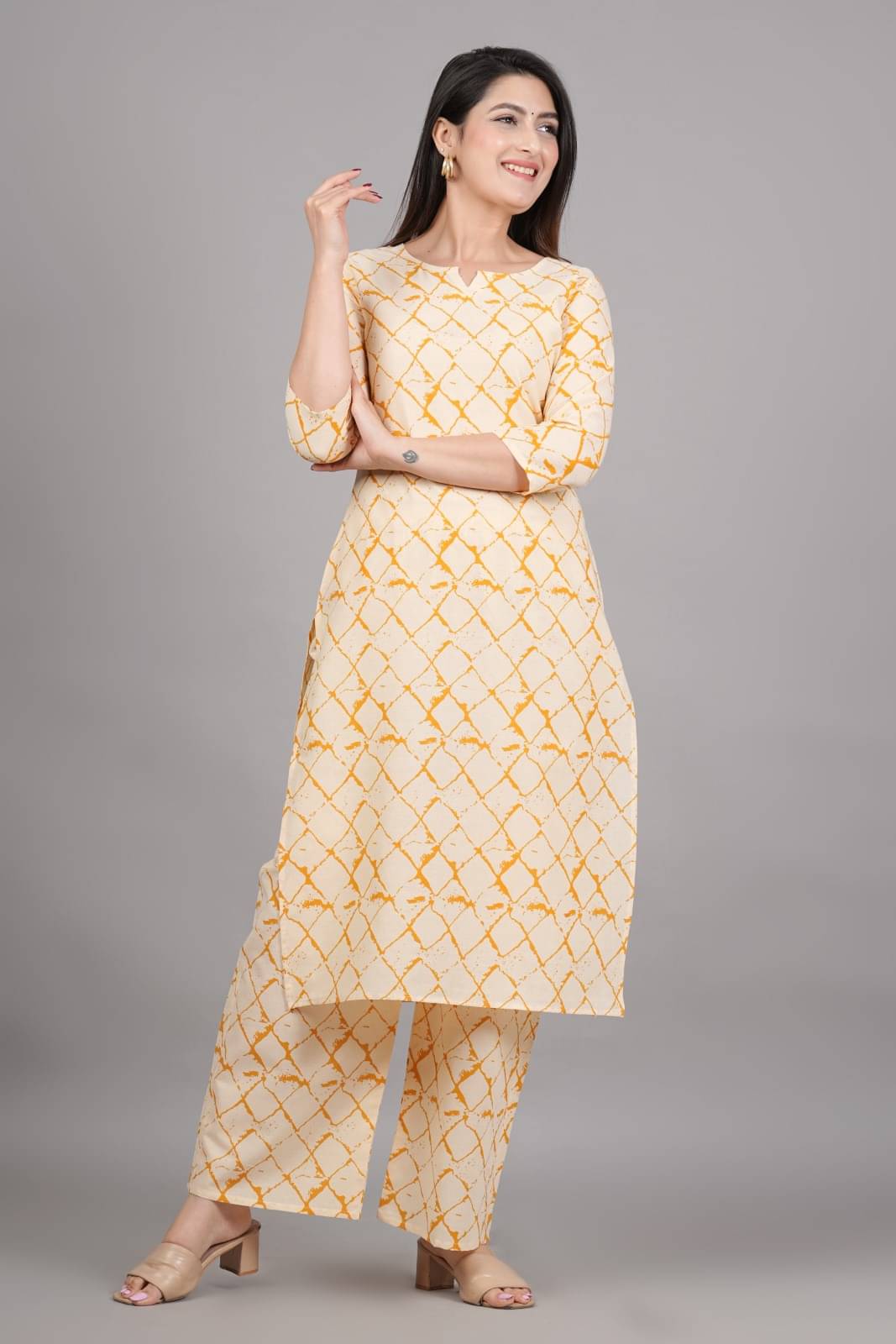 Metafab Women Cotton Blend Printed Straight Kurti With Palazzo ( Yellow ) Metafab Women Cotton Blend Printed Straight Kurti With Palazzo ( Yellow )