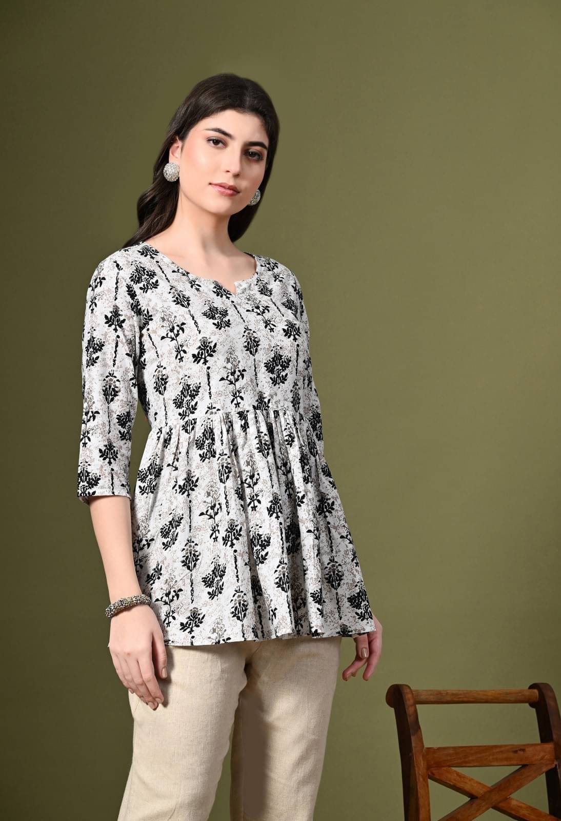 Metafab Women Viscose Rayon Printed Flared Kurti ( White ) Metafab Women Viscose Rayon Printed Flared Kurti ( White )