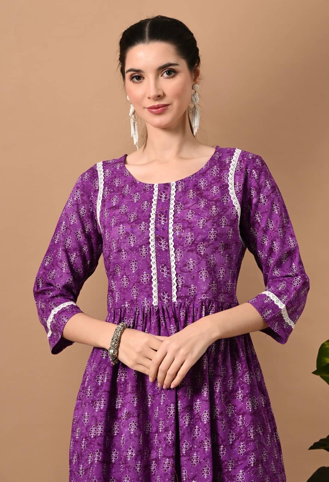 Metafab Women Viscose Rayon Printed Flared Kurti ( Purple ) Metafab Women Viscose Rayon Printed Flared Kurti ( Purple )