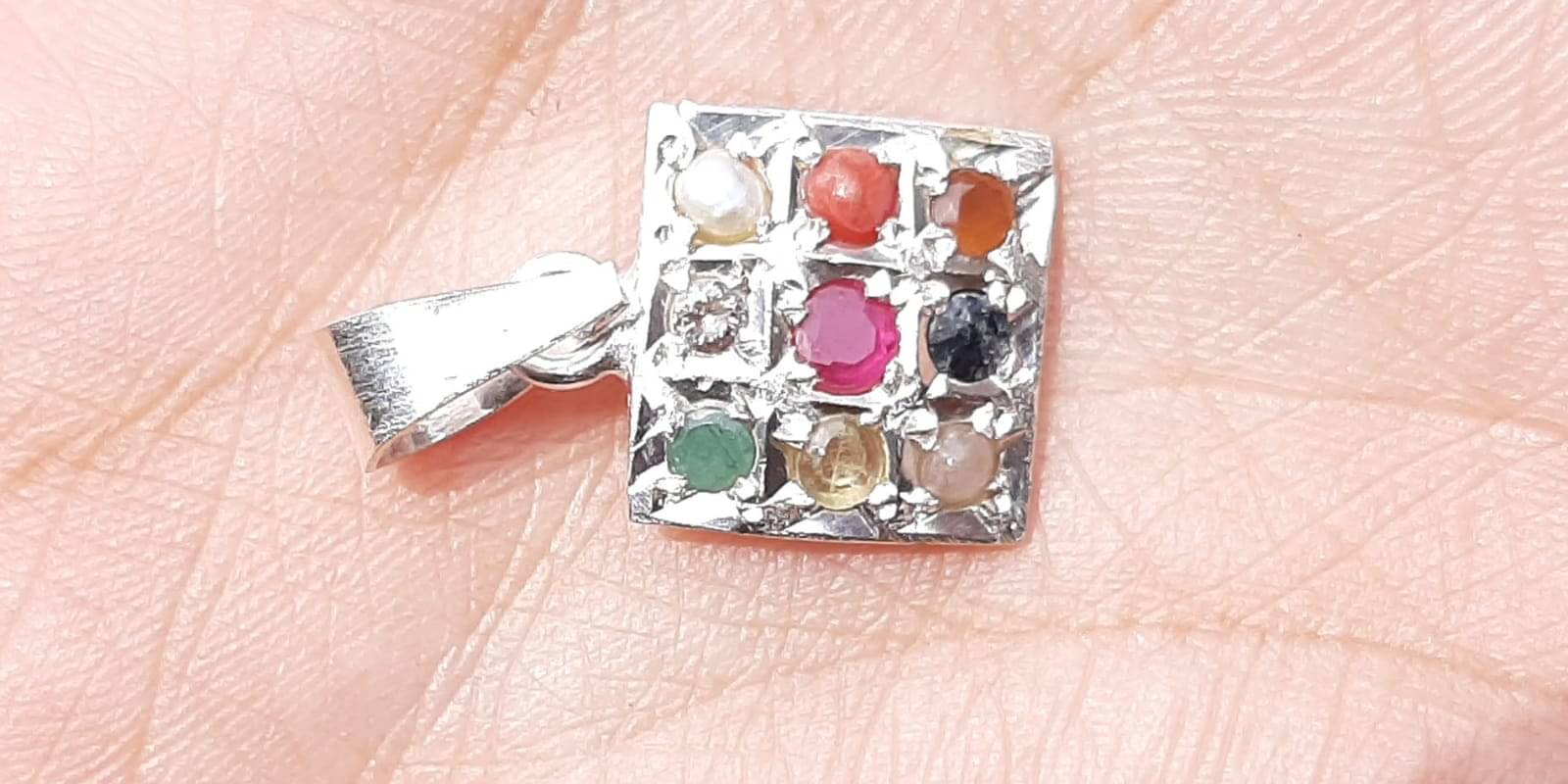     			NATURAL AND TOP QUALITY NAVRATAN SILVER PLATED PENDENT