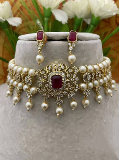     			Ridhi Sidhi Collection Red Brass Necklace Set ( Pack of 1 )