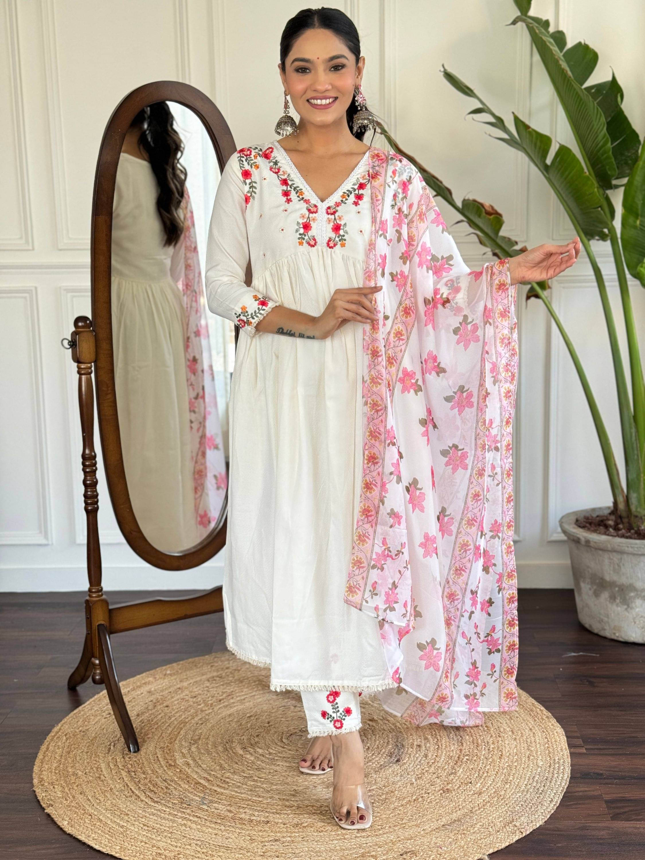 Niza Fashion Women Viscose Embroidered Flared Kurti With Pants ( White ) Niza Fashion Women Viscose Embroidered Flared Kurti With Pants ( White )