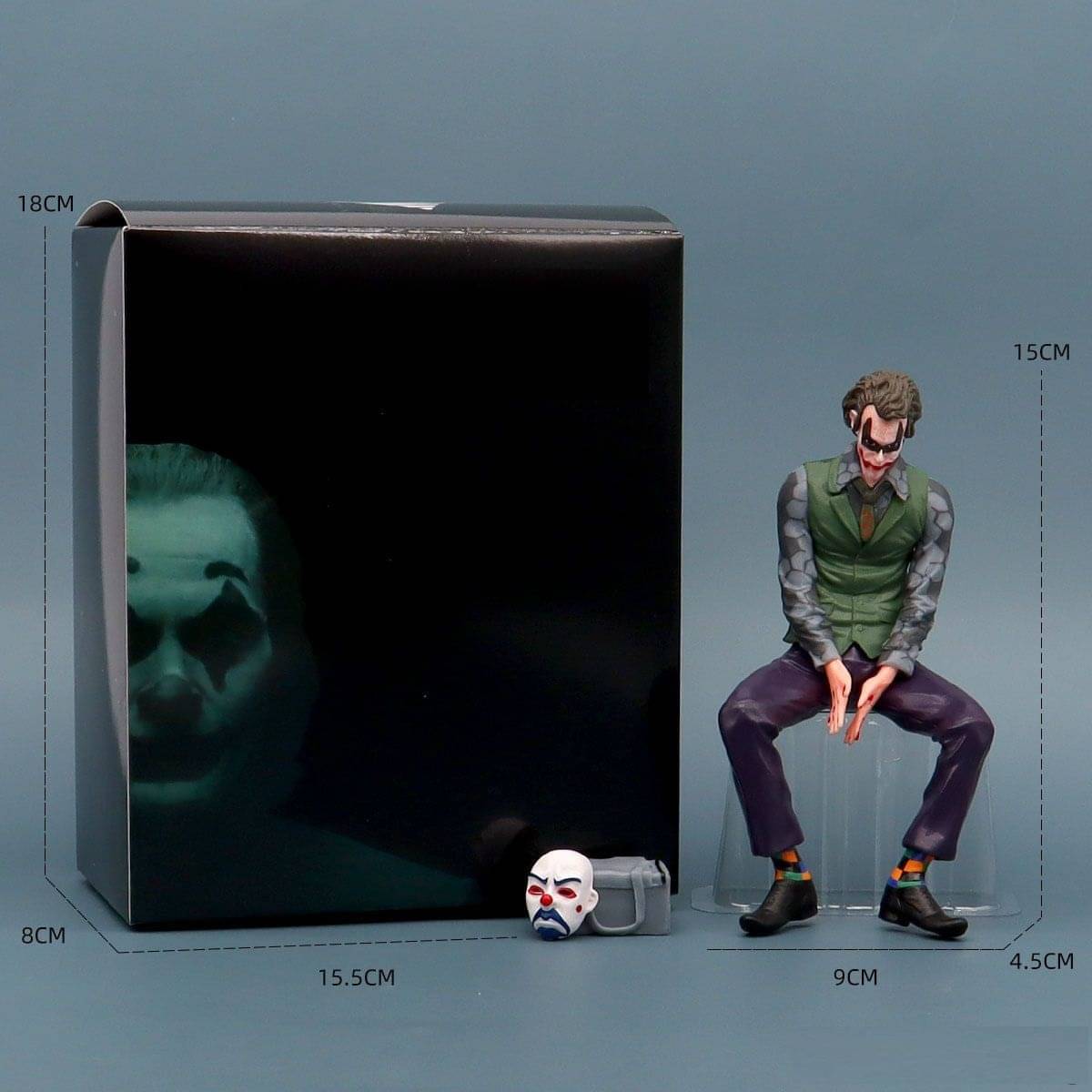     			Joker Action Figure – Joaquin Phoenix Inspired Collectible Statue, 15cm Tall with Mask Accessory, Premium Vinyl Figurine with Gift Box – Dark Knight Villain Model Toy for Fans and Collectors