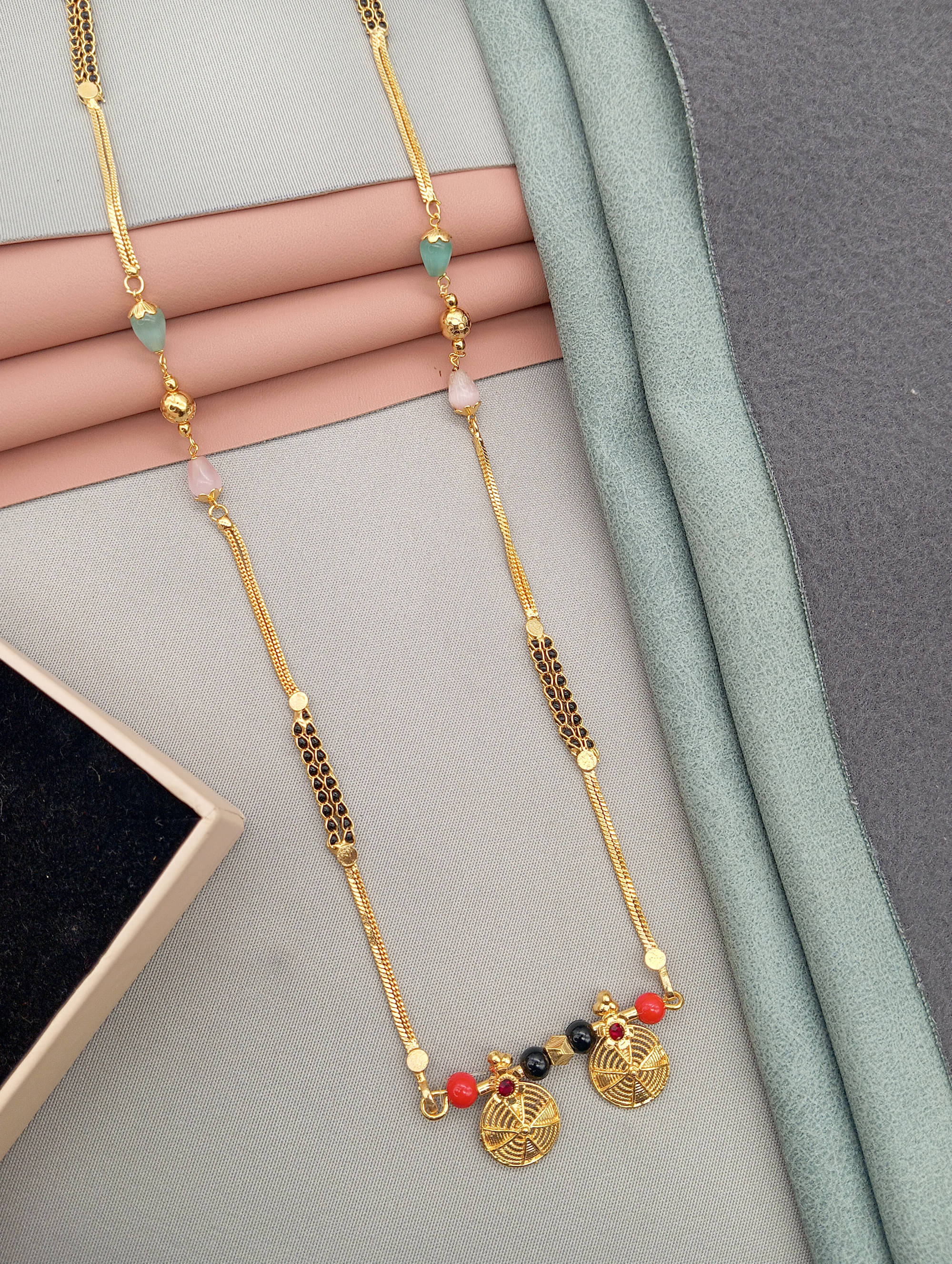     			SHANKHRAJ MA LL Golden Mangalsutra ( Pack of 1 )