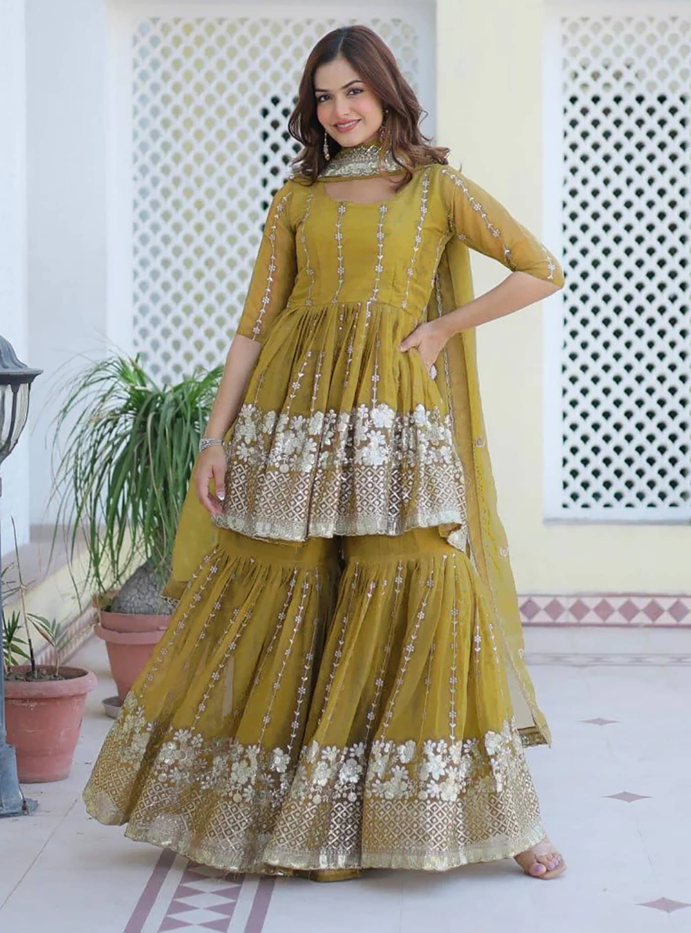     			Trijal Fab Women Georgette Embroidered A-line Kurti With Sharara And Gharara ( Mustard )
