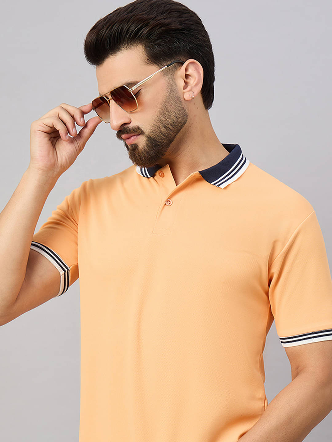 Merriment Men Cotton Blend Regular Fit Solid Polo T Shirt ( Yellow ) Merriment Men Cotton Blend Regular Fit Solid Polo T Shirt ( Yellow )