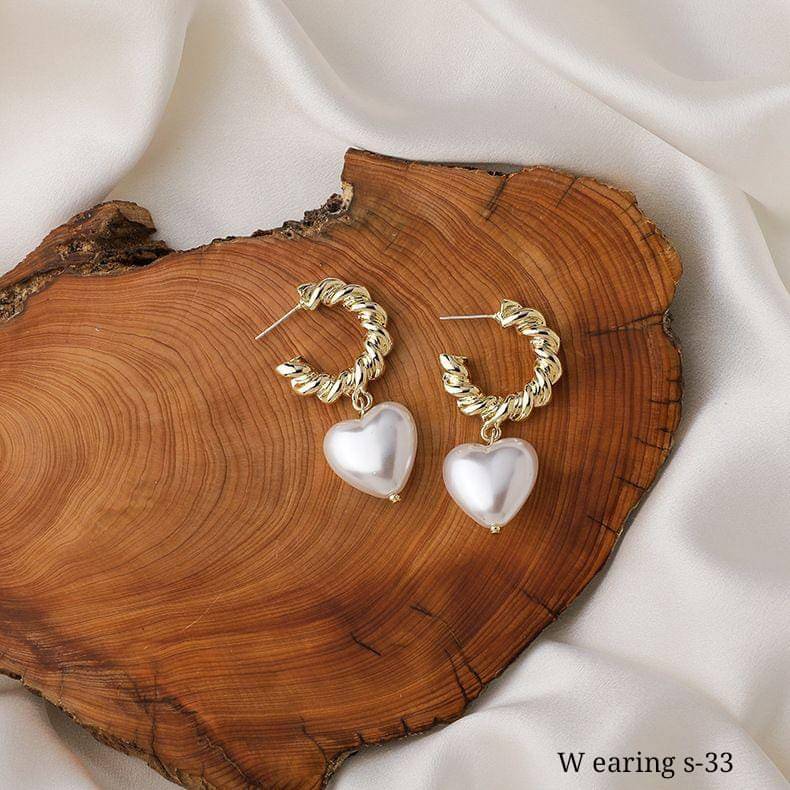    			RANEM White Hoops Earrings ( Pack of 1 )