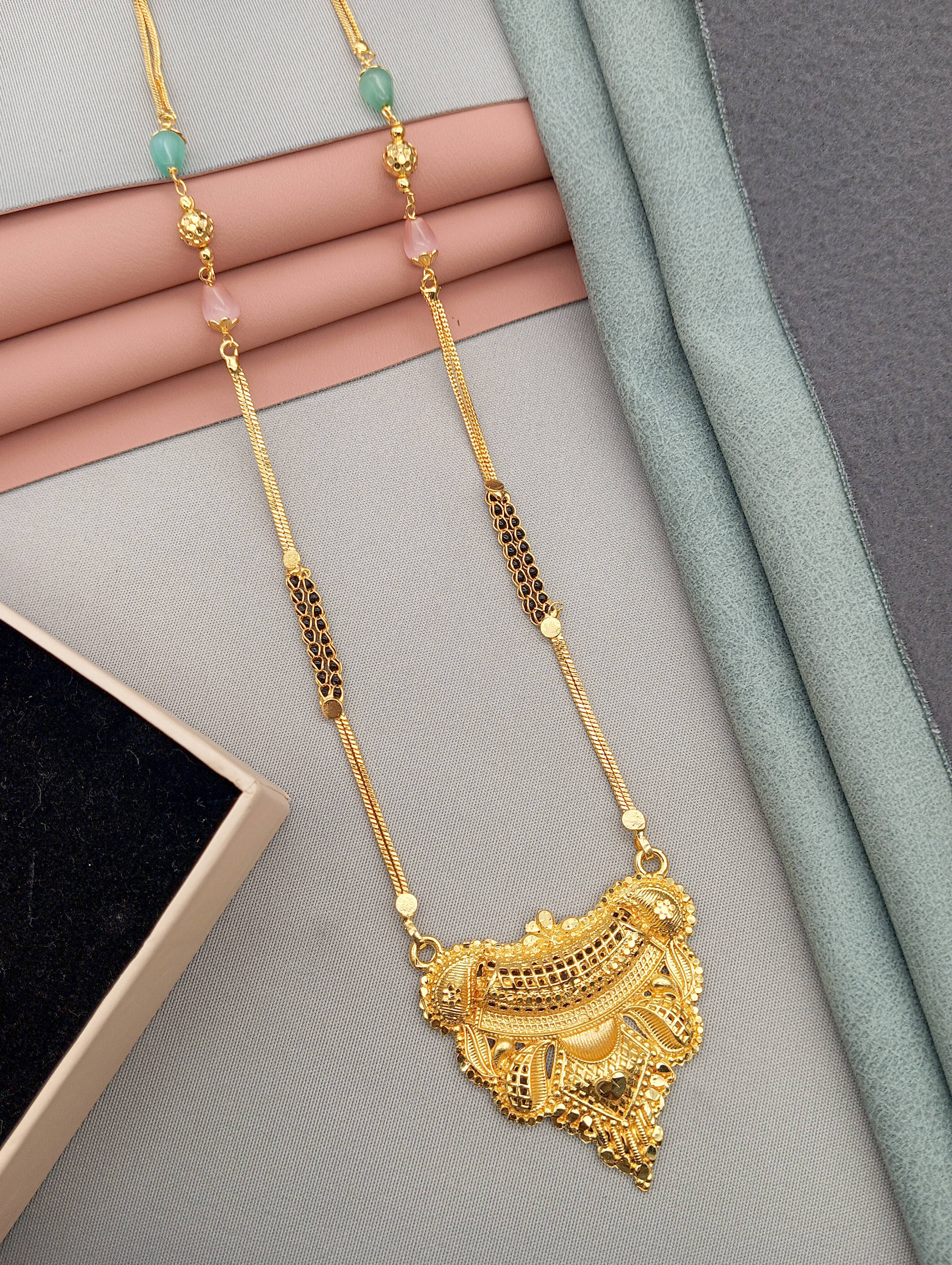 SHANKH-KRIVA Golden Mangalsutra ( Pack of 1 ) SHANKH-KRIVA Golden Mangalsutra ( Pack of 1 )