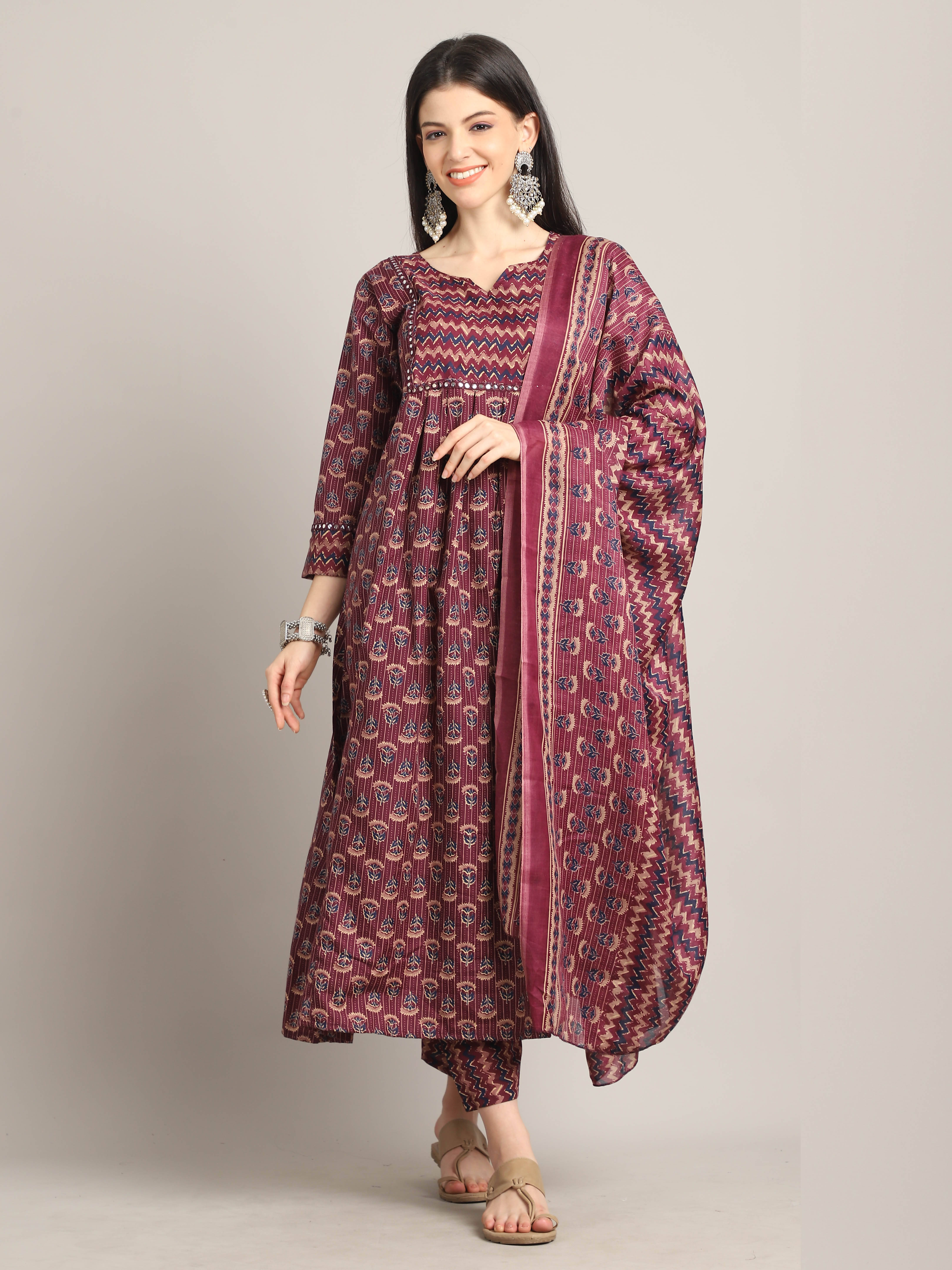     			Rajnandini Women Cotton Blend Printed Flared Kurti With Pants ( Wine )