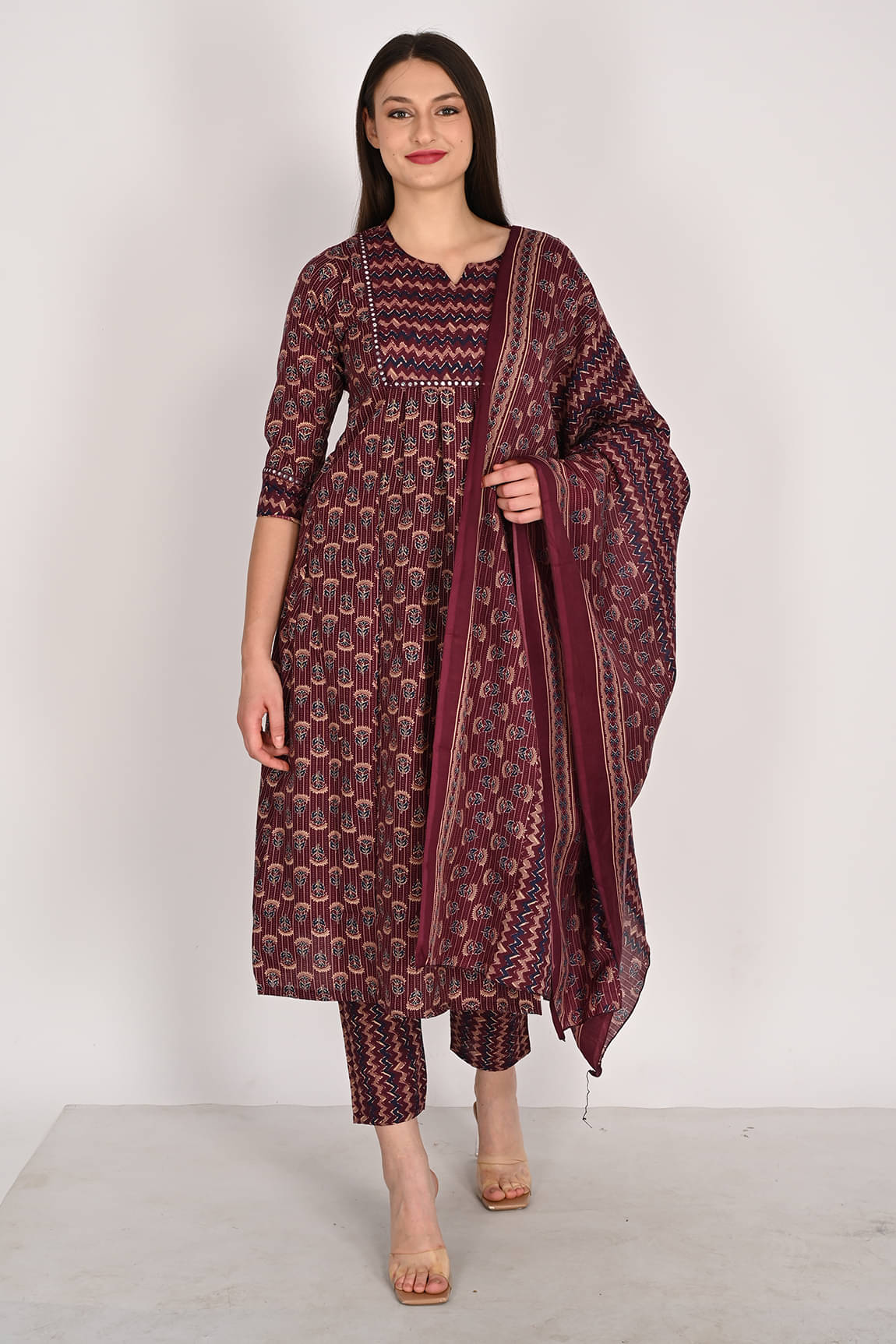 Rajnandini Women Cotton Blend Printed Flared Kurti With Pants ( Wine ) Rajnandini Women Cotton Blend Printed Flared Kurti With Pants ( Wine )