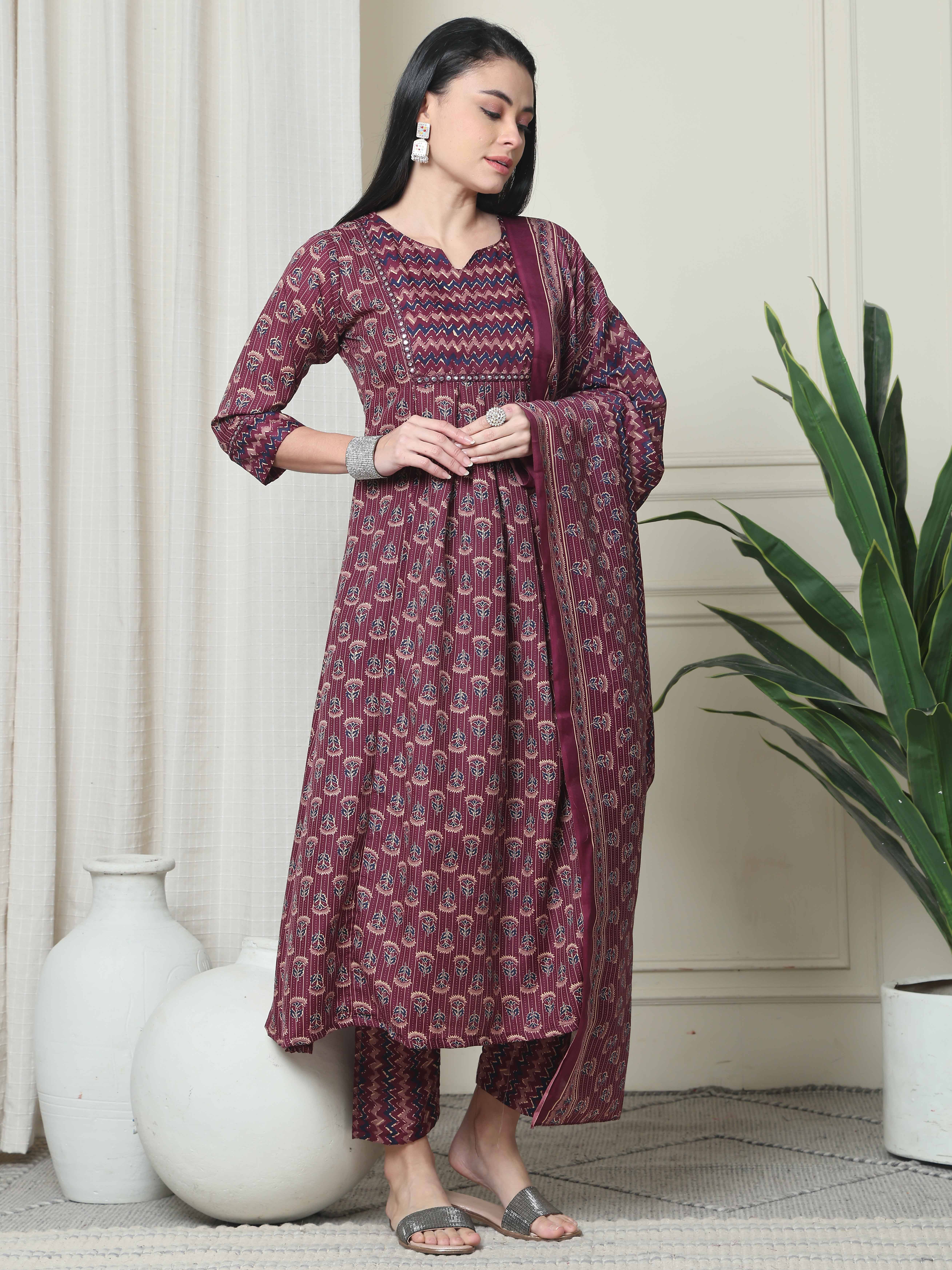 Rajnandini Women Cotton Blend Printed Flared Kurti With Pants ( Wine ) Rajnandini Women Cotton Blend Printed Flared Kurti With Pants ( Wine )