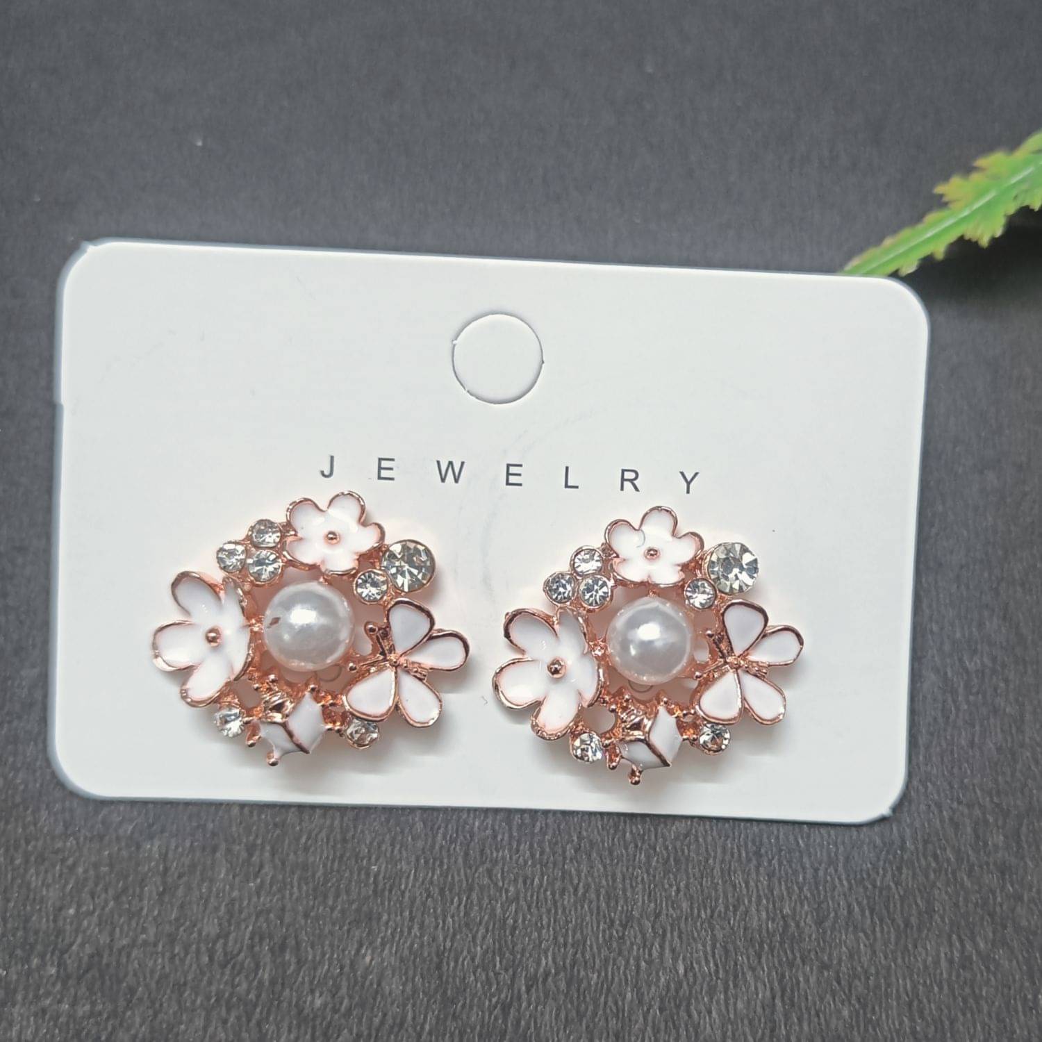     			Style Wind Rose Gold Stud Earrings ( Pack of 1 )