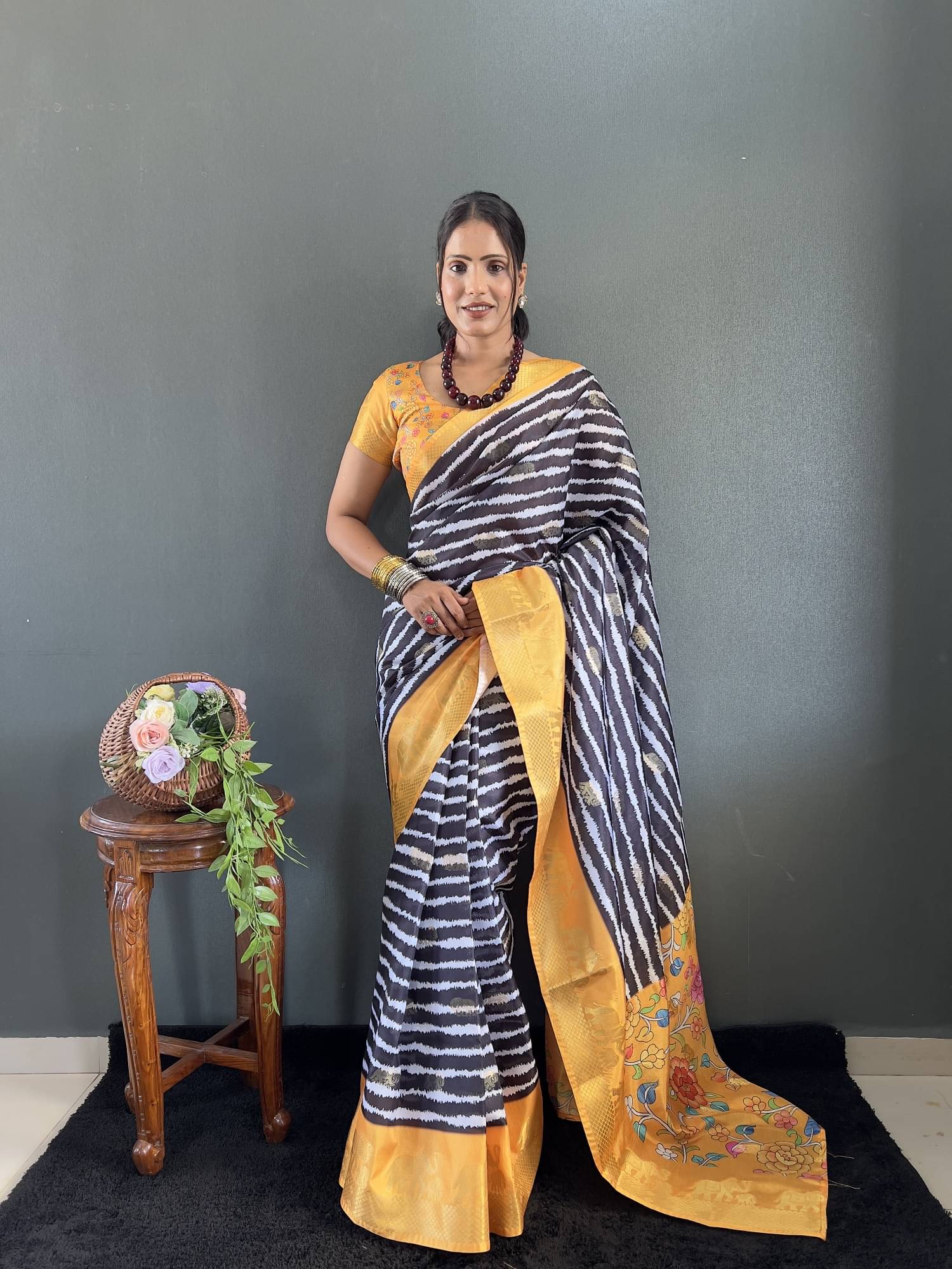     			Apnisha Silk Printed Banarasi saree With Unstitched Blouse Piece ( Black )