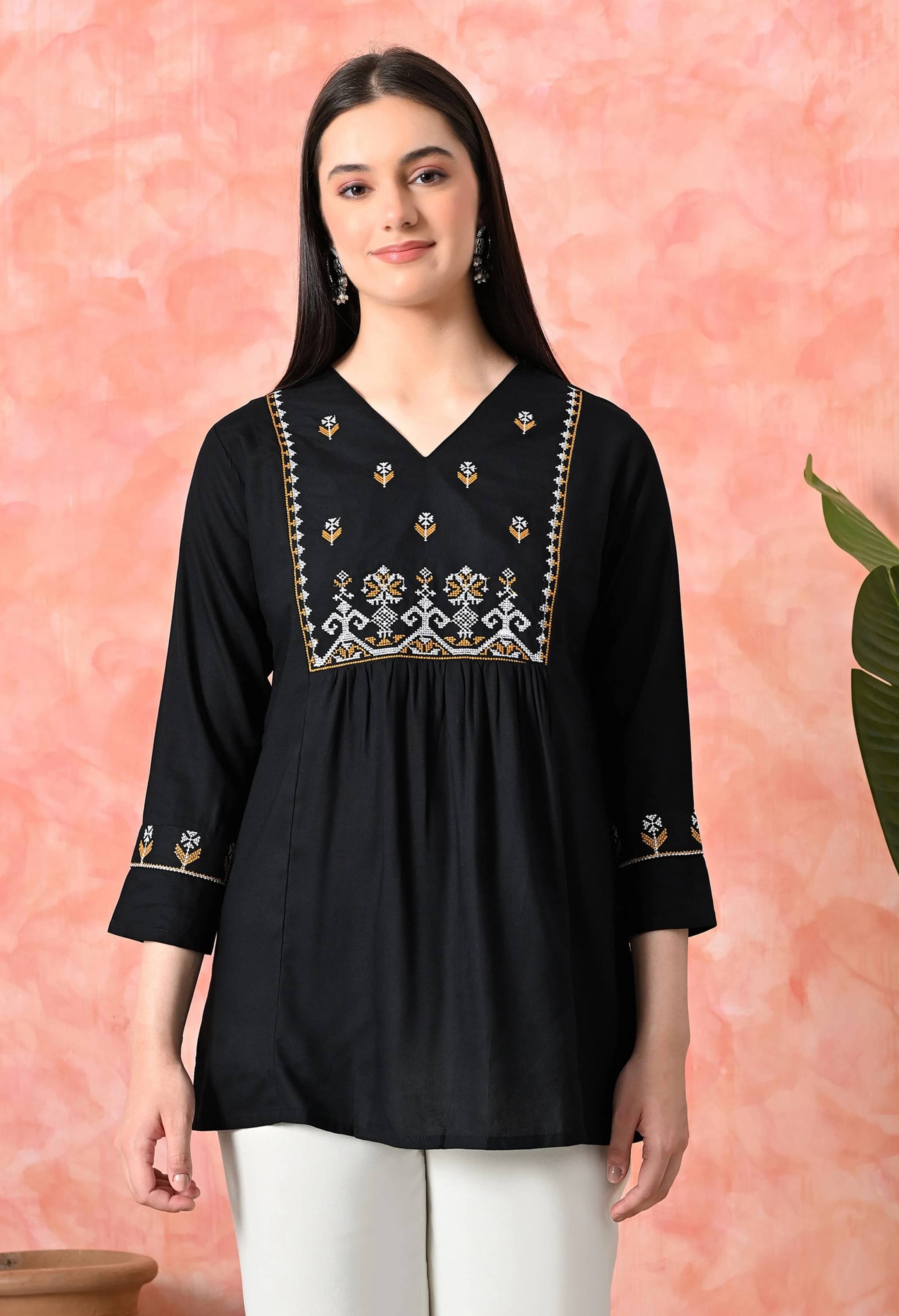 Emica Women Viscose Rayon Embroidered Straight Kurti ( Black ) Emica Women Viscose Rayon Embroidered Straight Kurti ( Black )